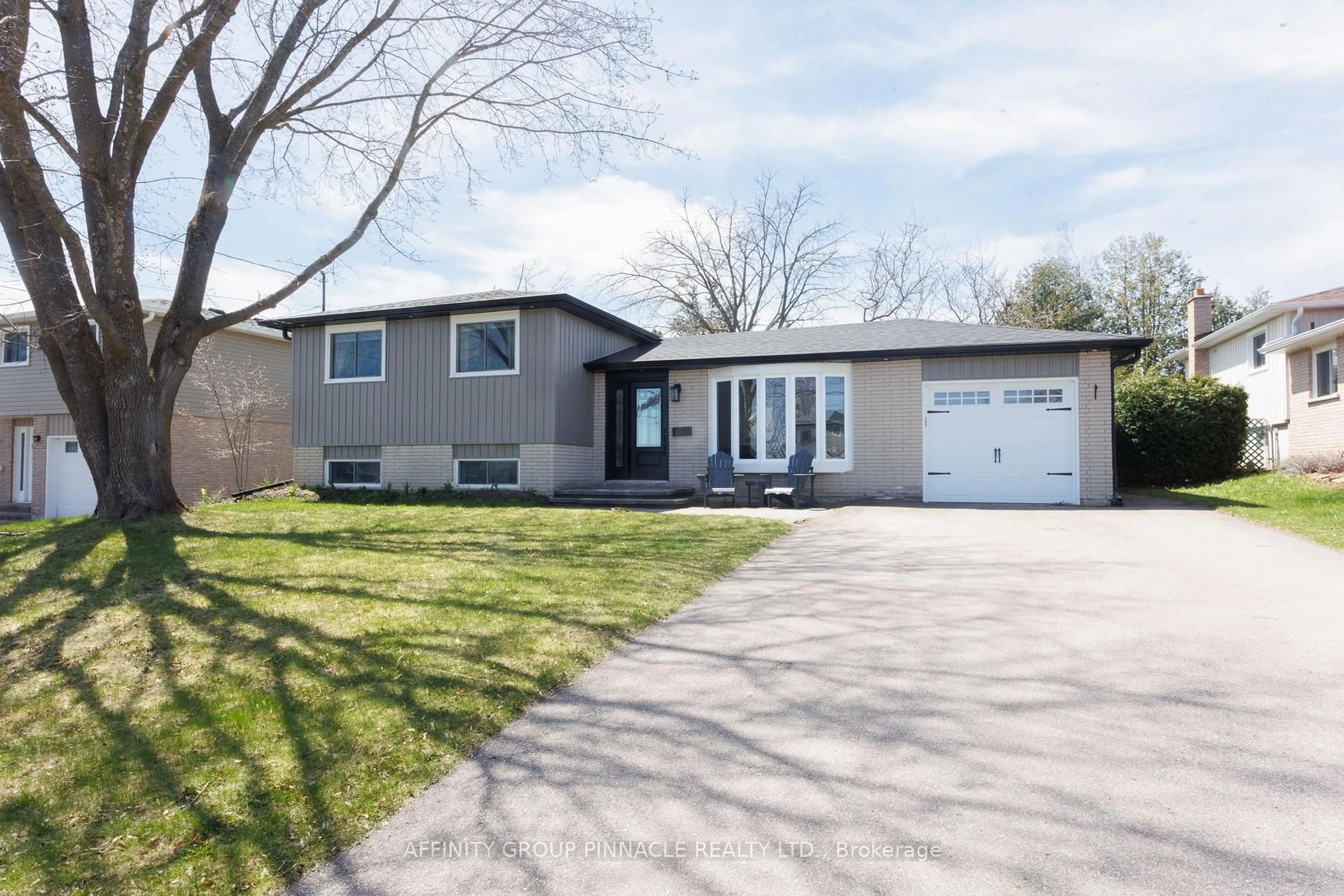Home with vinyl exterior material, street for 19 Mohawk Dr, Kawartha Lakes Ontario K9V 0J6