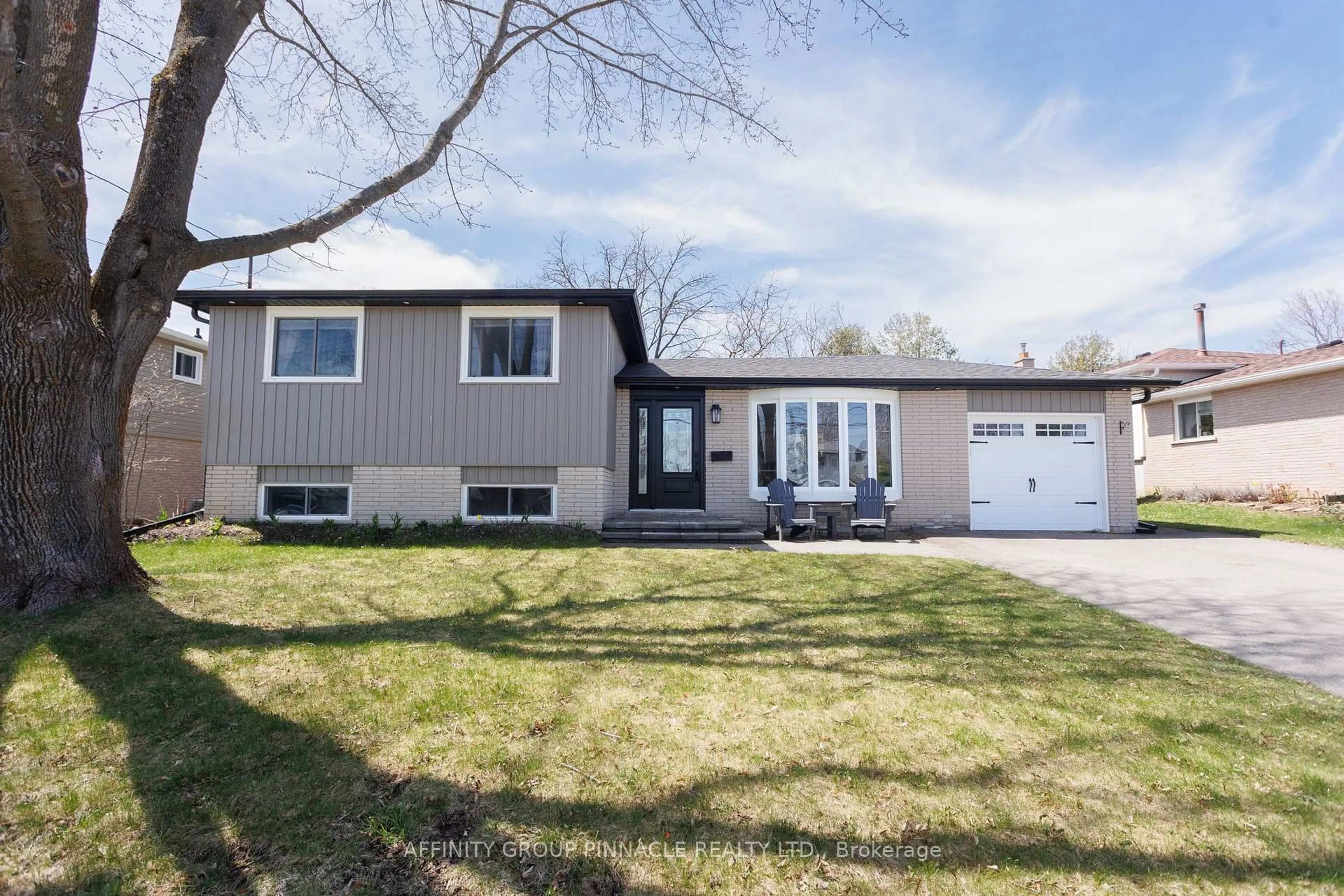 Home with vinyl exterior material, street for 19 Mohawk Dr, Kawartha Lakes Ontario K9V 0J6