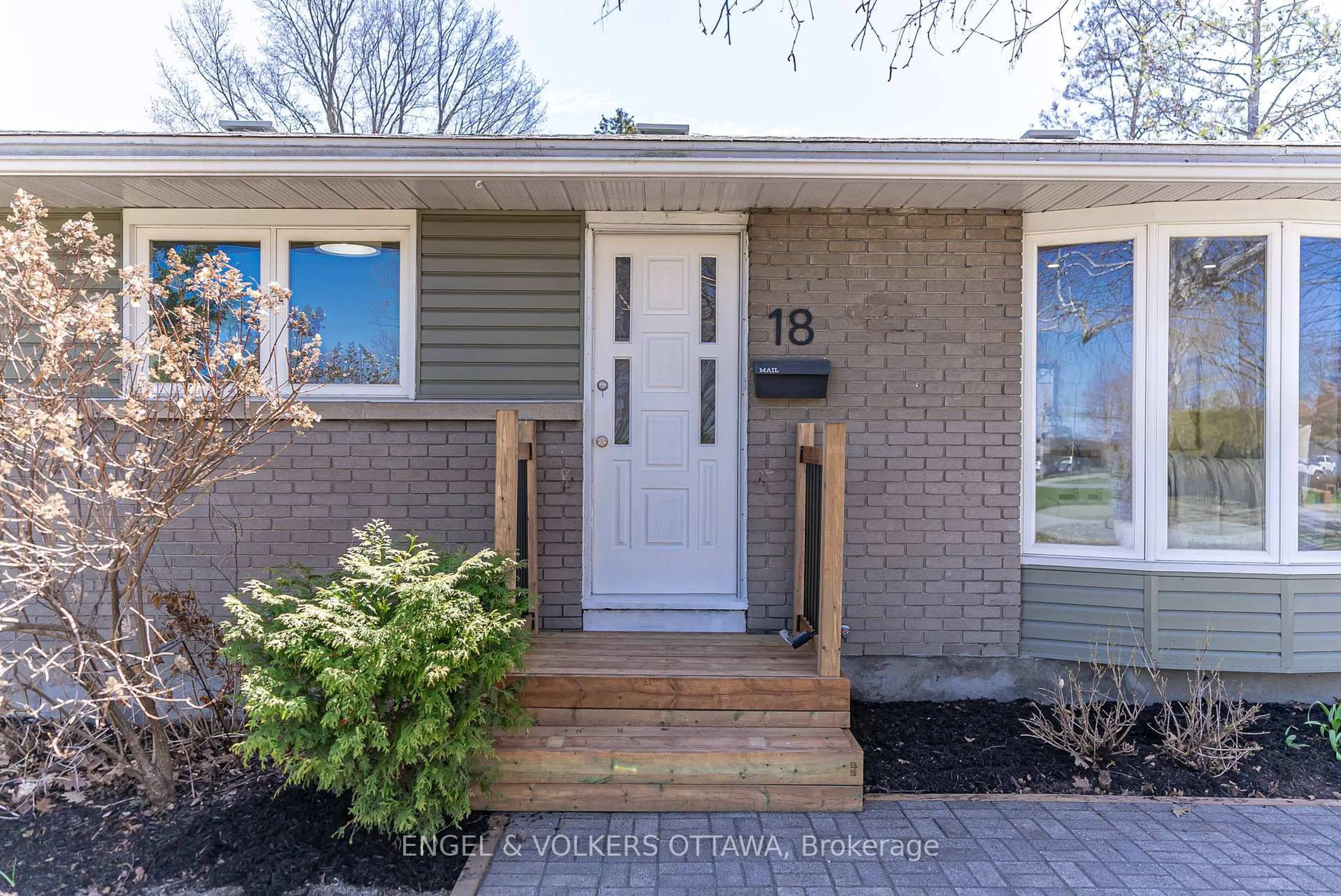 Home with brick exterior material, street for 18 Dante Ave, Ottawa Ontario K2H 5Z8