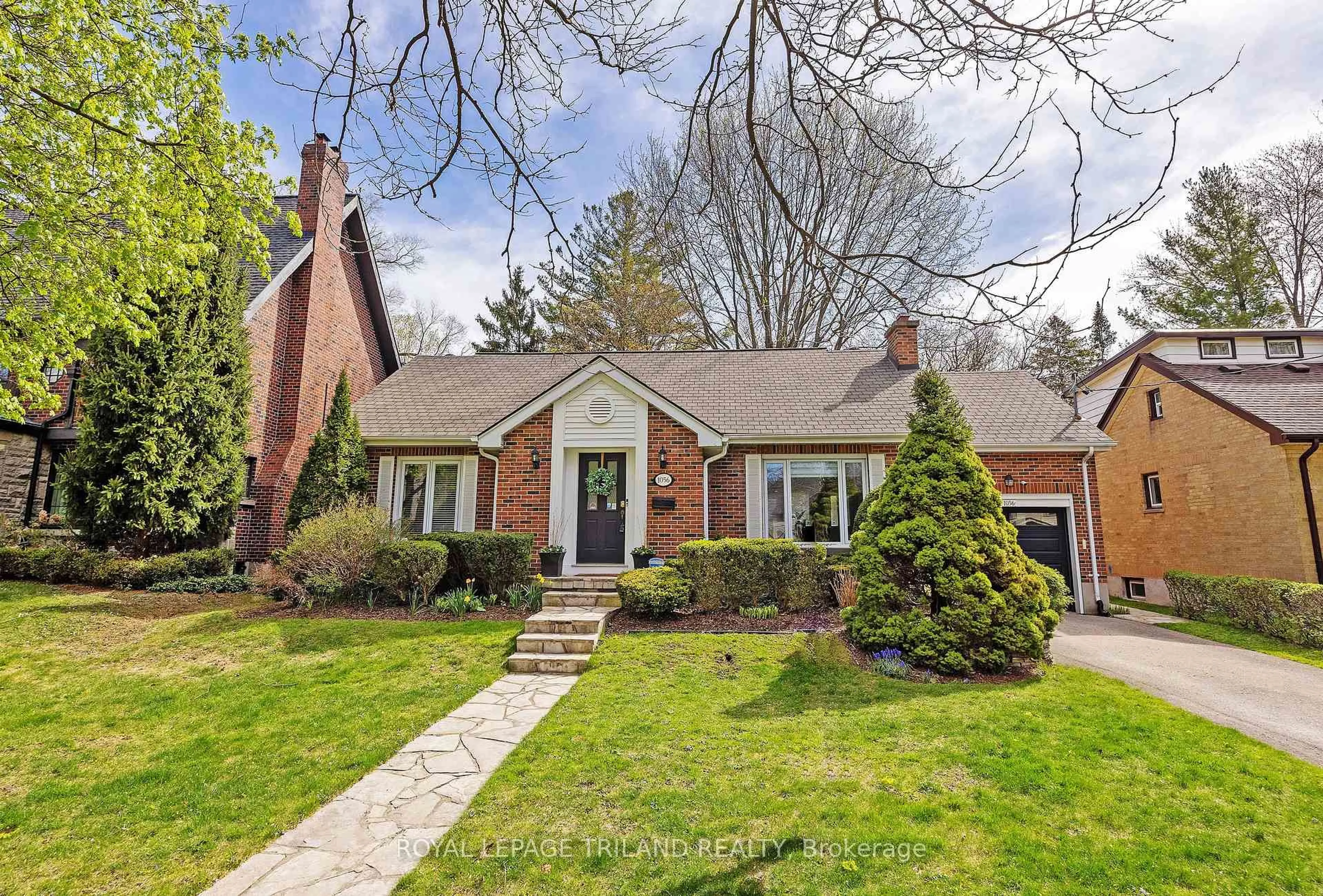 Home with brick exterior material, street for 1056 The Pkwy, London East Ontario N6A 2W7