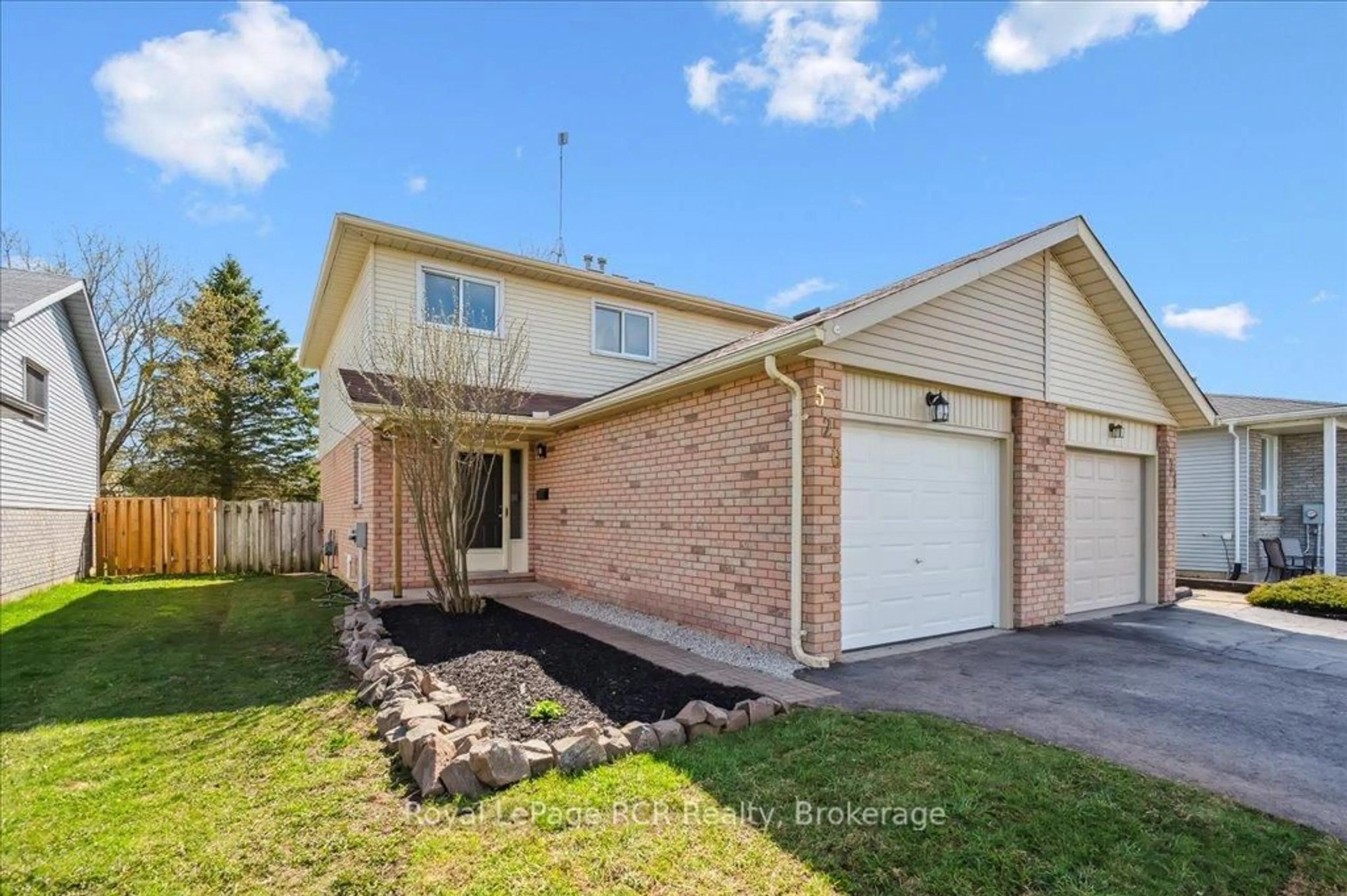 Home with brick exterior material, street for 520 Cork St, Wellington North Ontario N0G 2L3