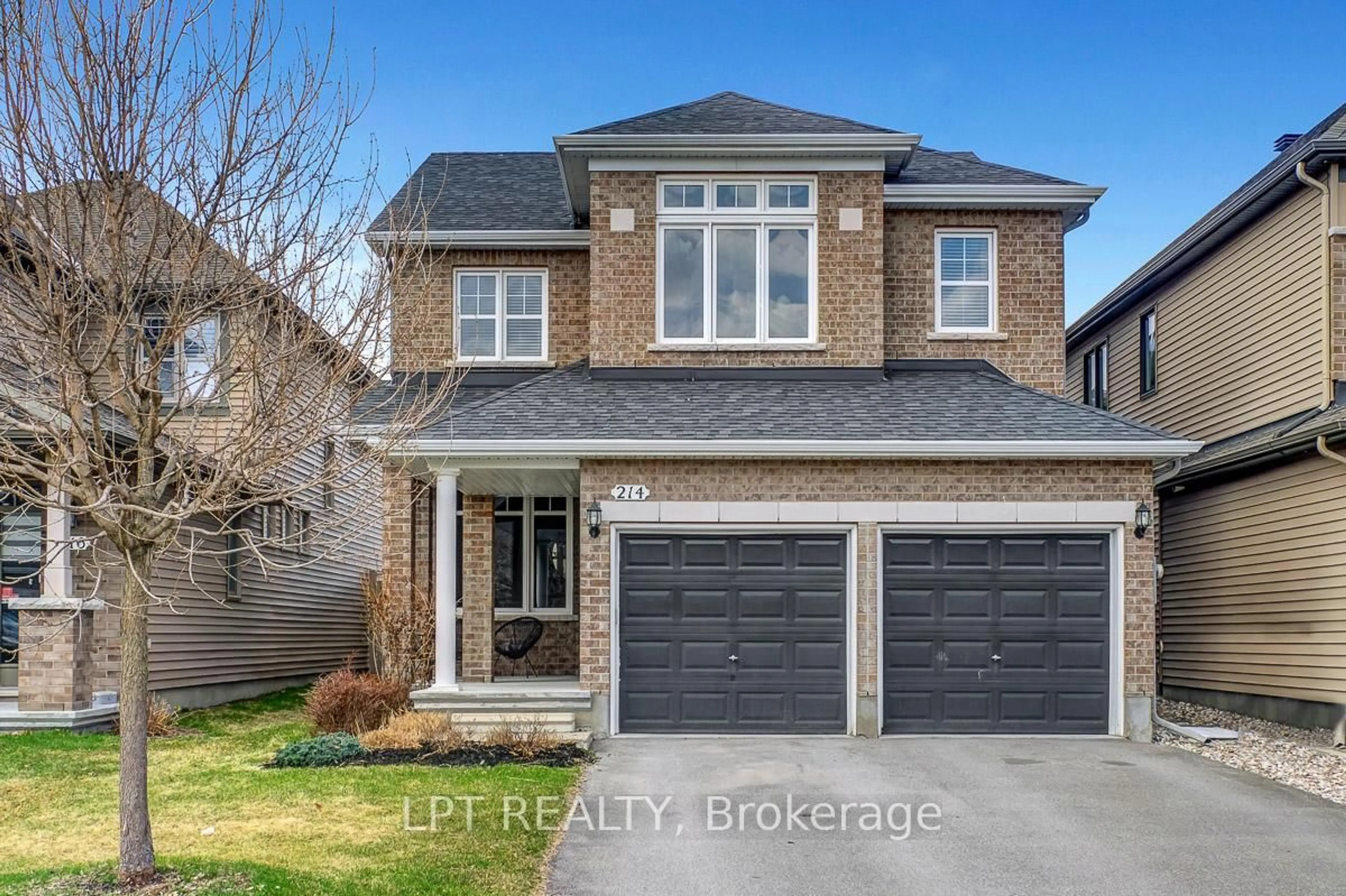 Home with brick exterior material, street for 214 Shinleaf Cres, Ottawa Ontario K1W 0J2