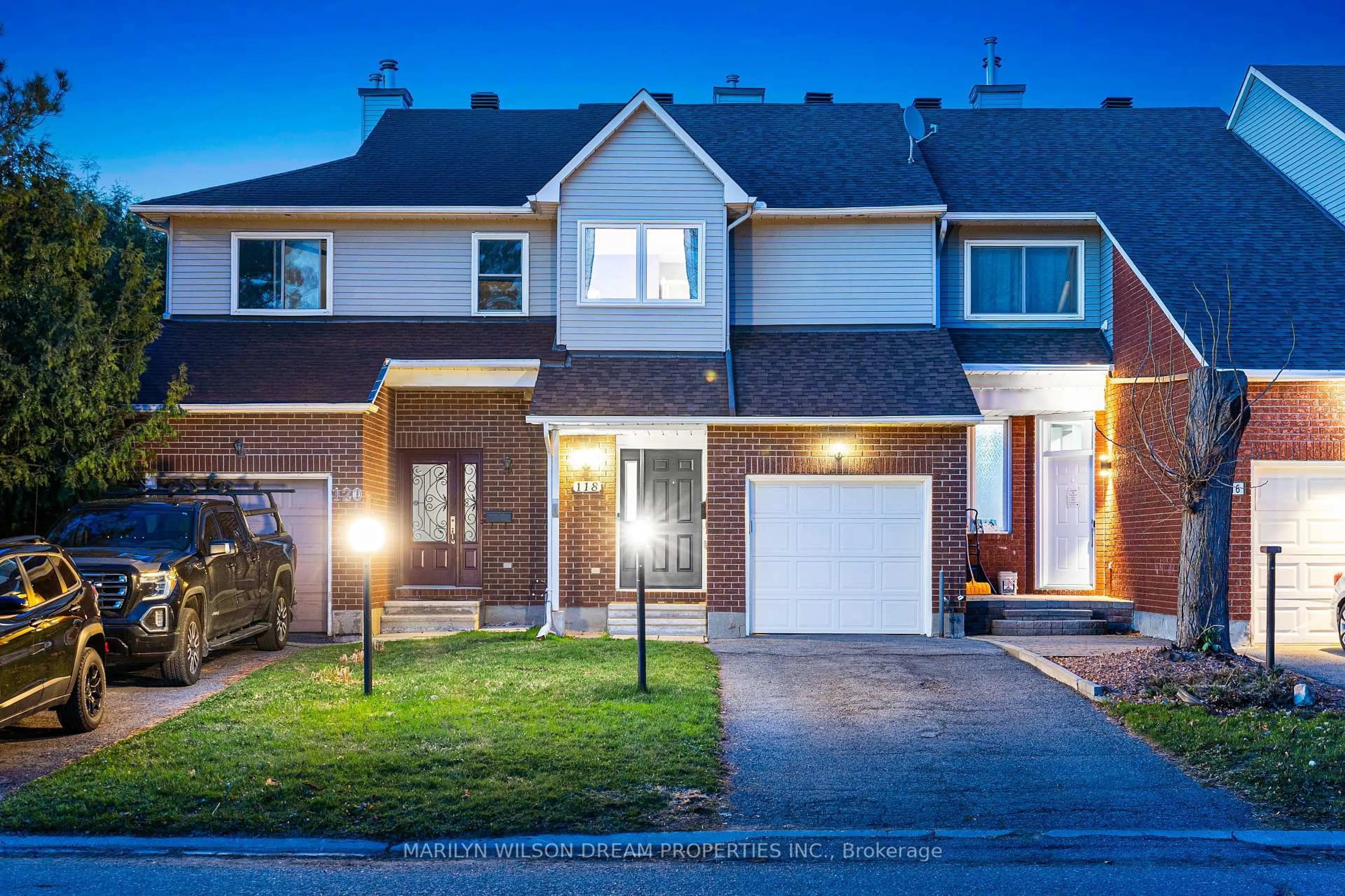 Home with brick exterior material, street for 118 Halley St, Barrhaven Ontario K2J 3R9
