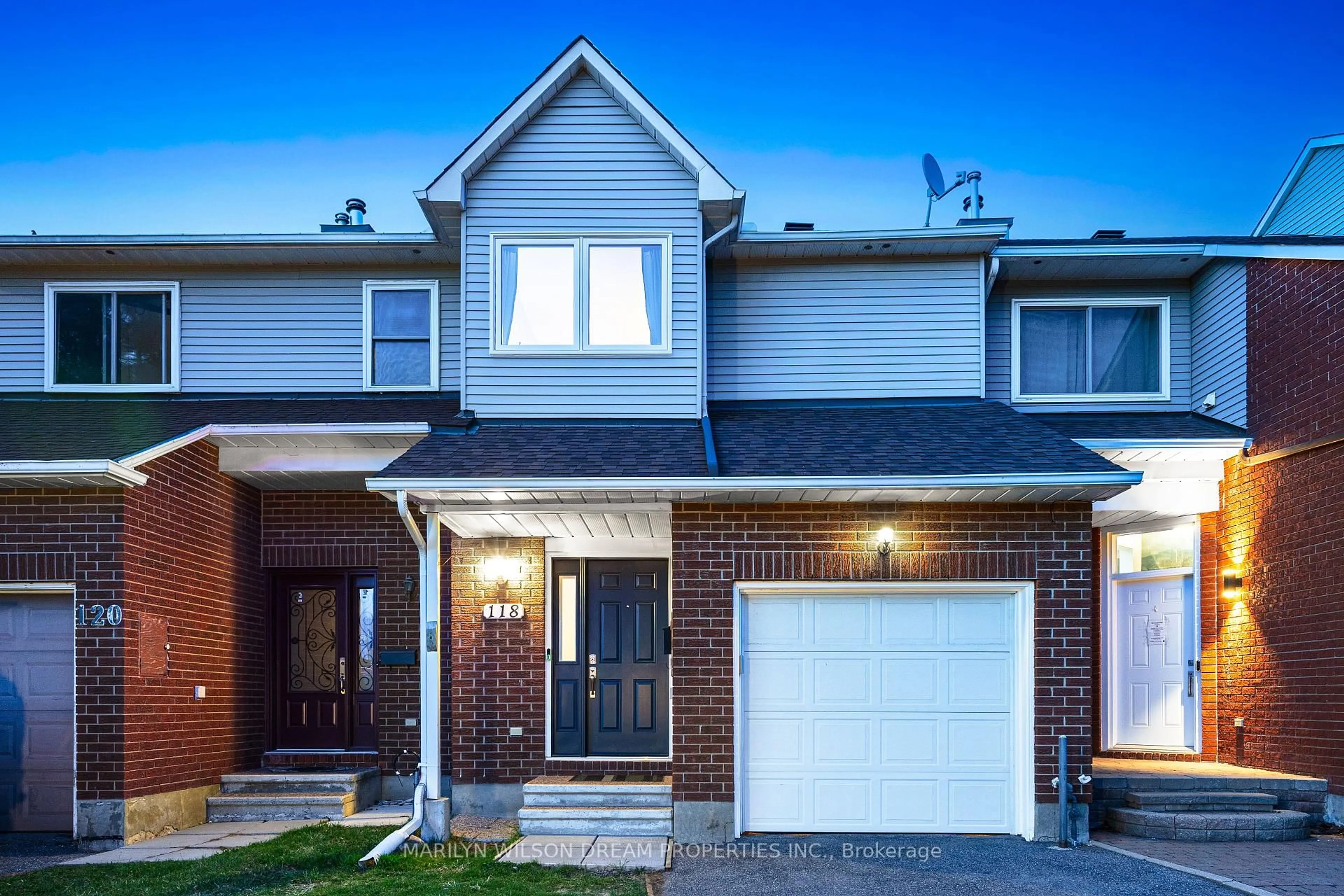 Home with brick exterior material, street for 118 Halley St, Barrhaven Ontario K2J 3R9