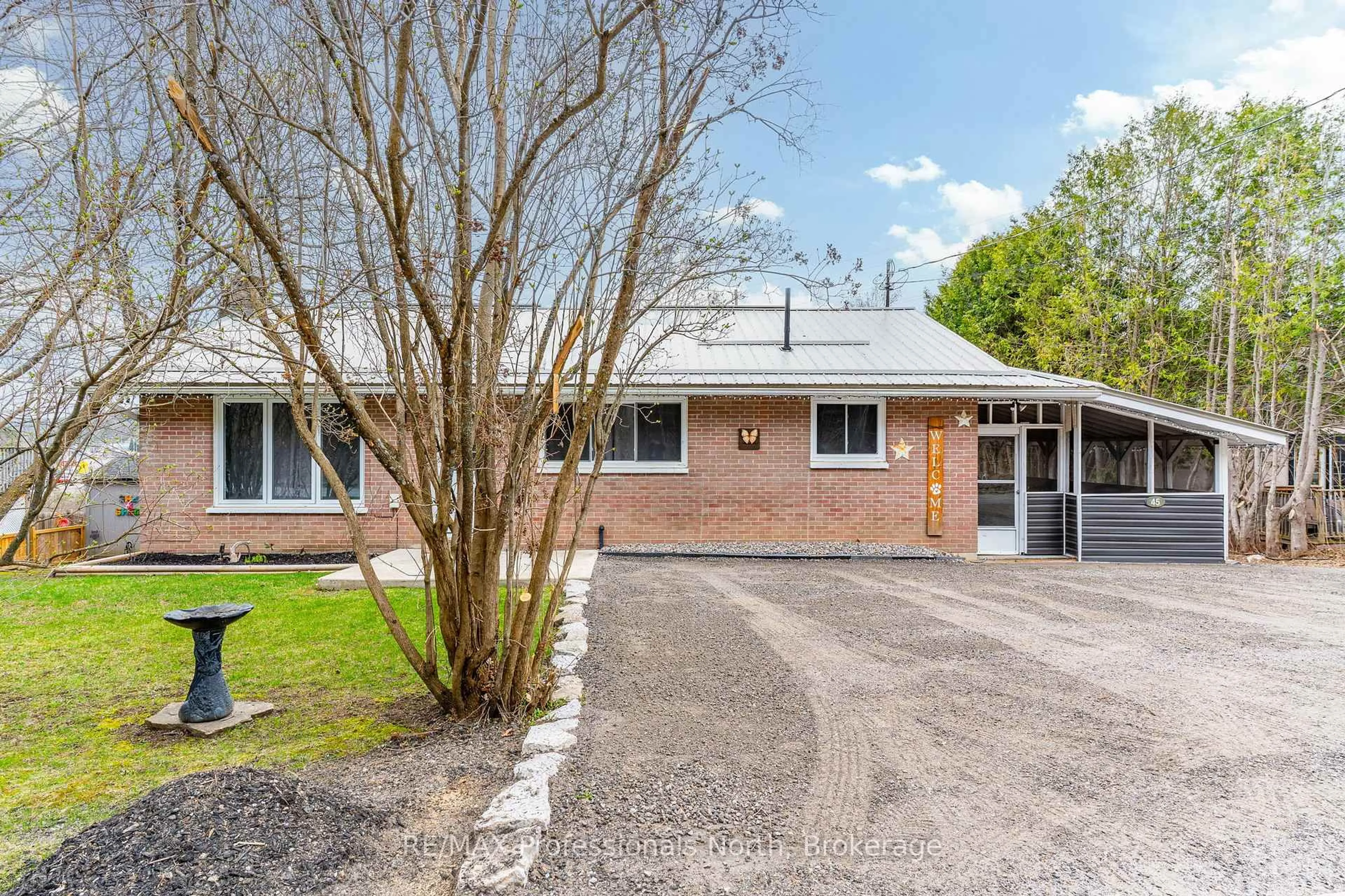 Home with brick exterior material, street for 45 Newcastle St, Minden Hills Ontario K0M 2K0