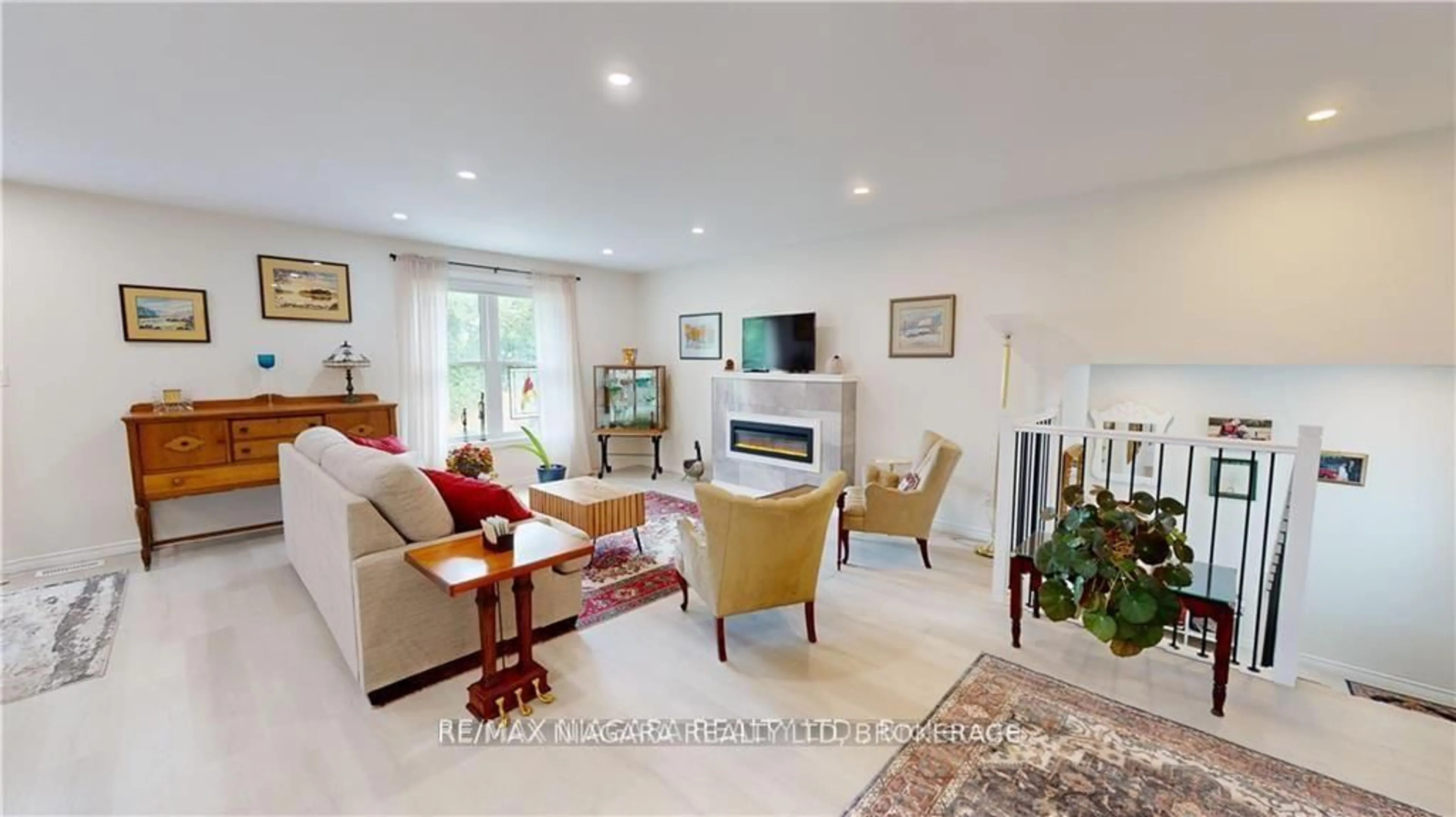 Living room with furniture, ceramic/tile floor for 84 Ziraldo Rd, St. Catharines Ontario L2N 6T1