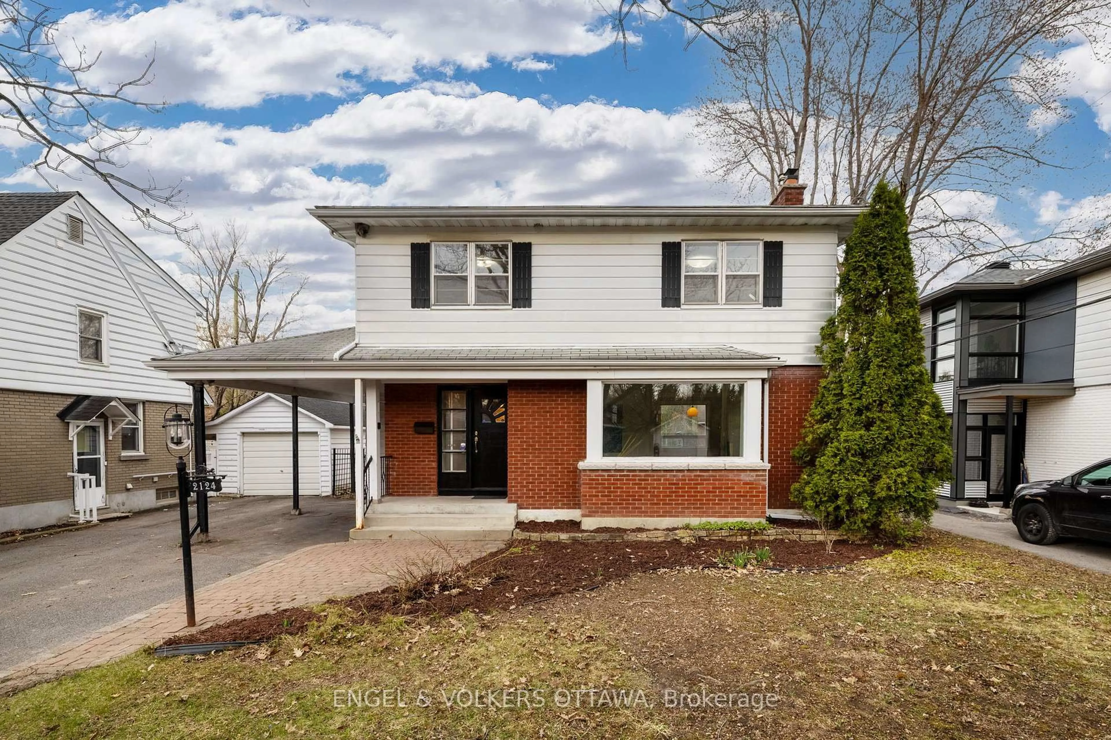 Home with brick exterior material, street for 2124 Blossom Dr, Ottawa Ontario K1H 6G8