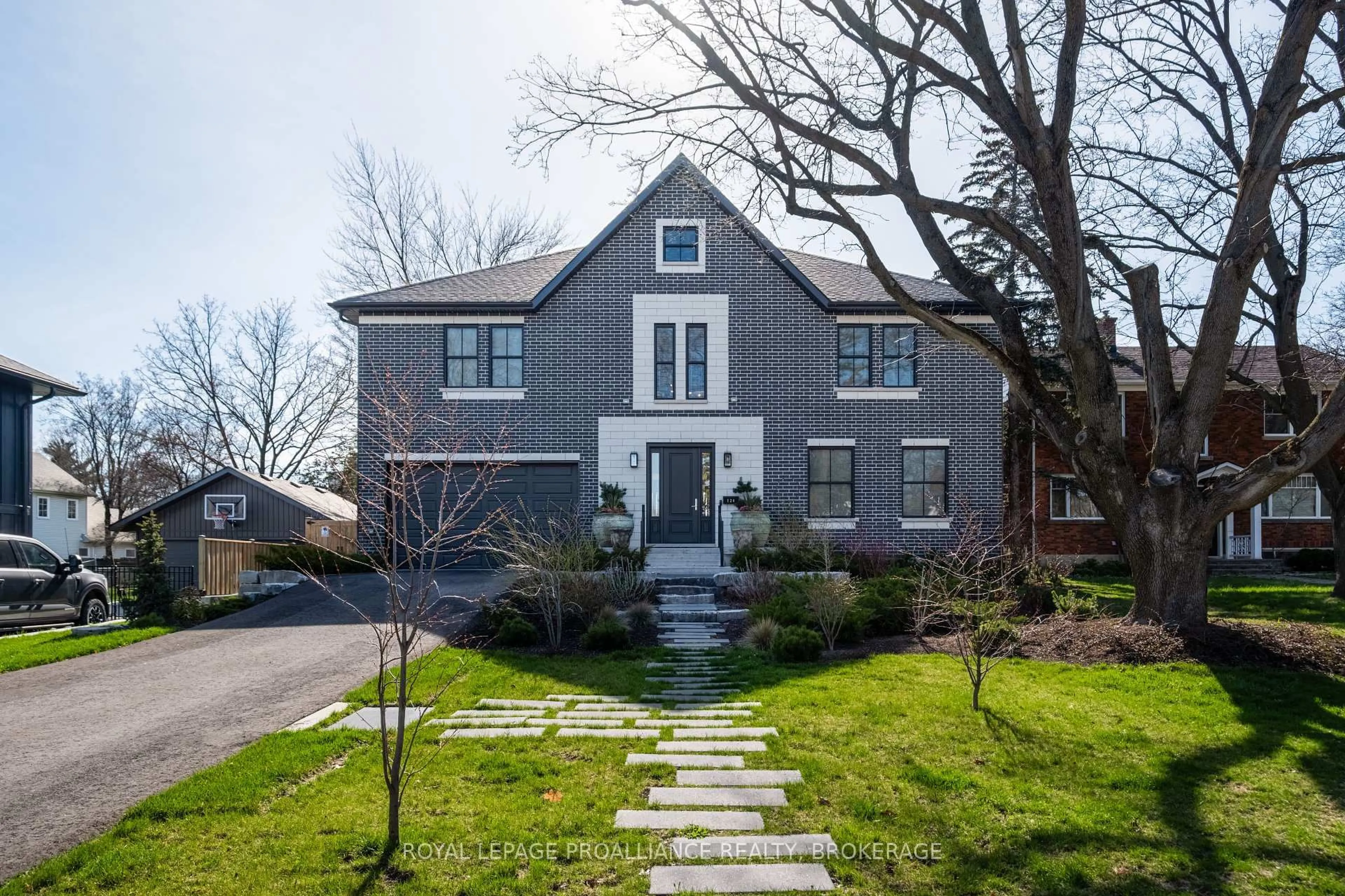 Home with brick exterior material, street for 124 Churchill Cres, Kingston Ontario K7L 4N2