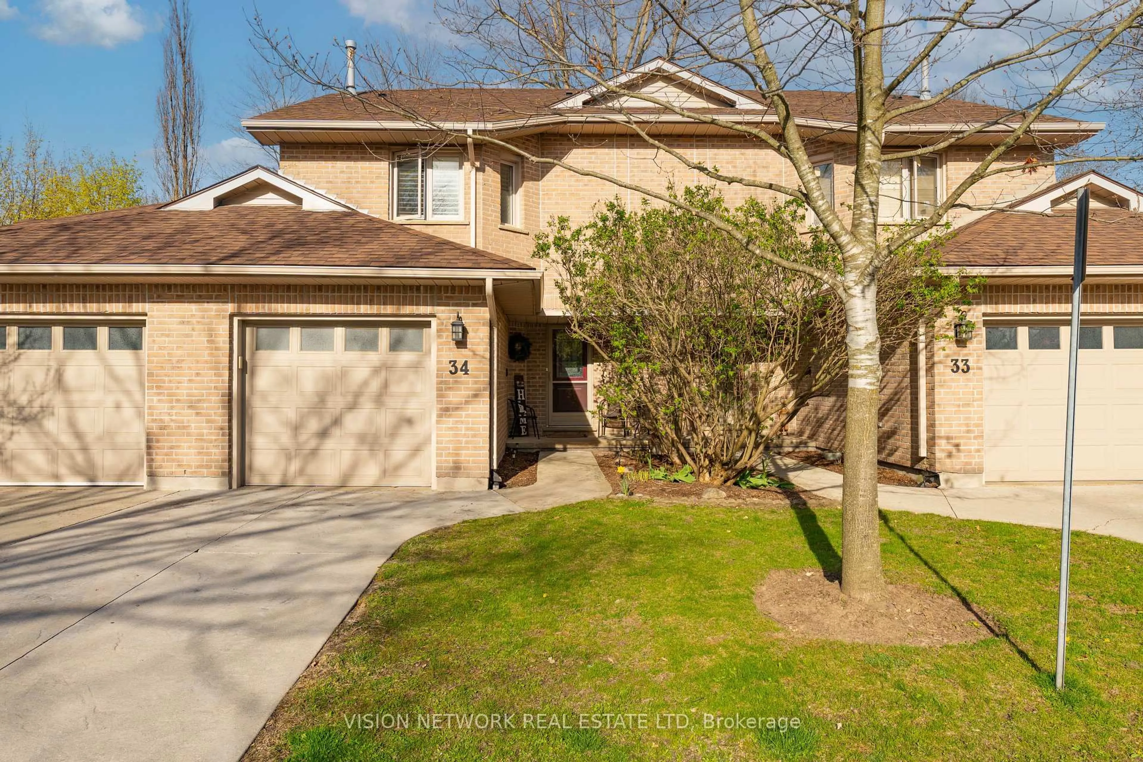 A pic from outside/outdoor area/front of a property/back of a property/a pic from drone, street for 70 Glenroy Rd #34, London South Ontario N5Z 4X1