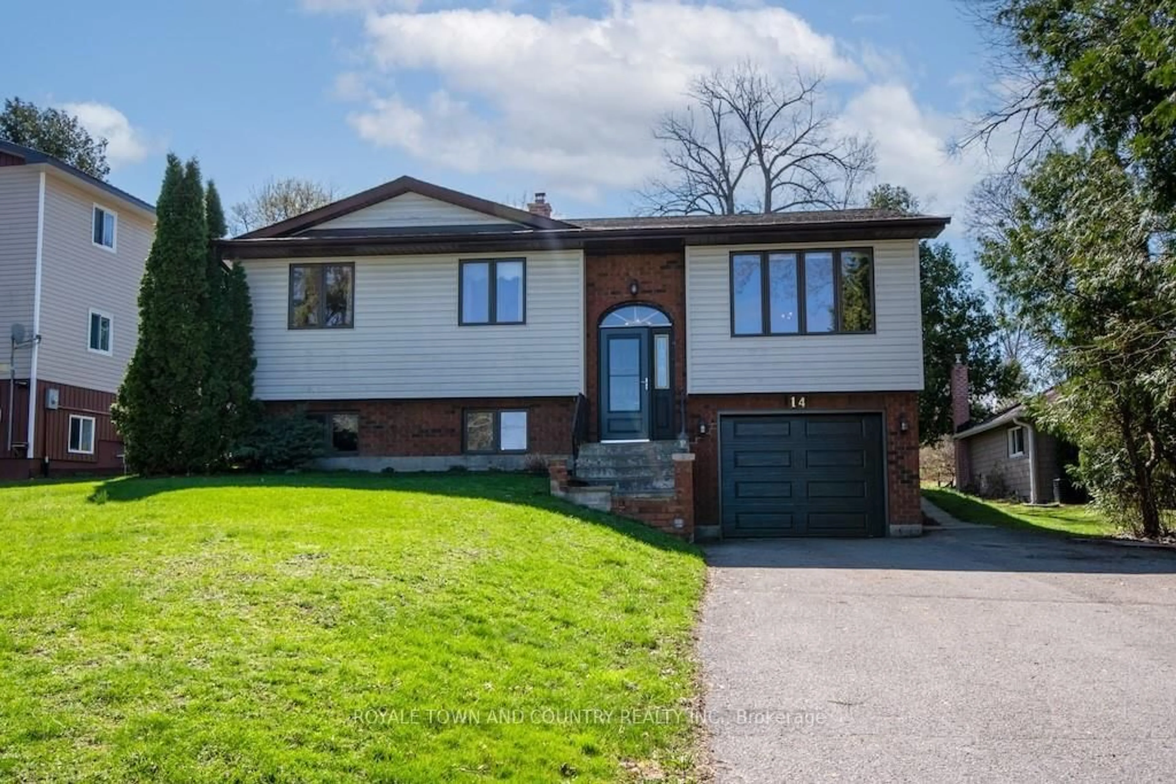 Home with brick exterior material, street for 14 McGill Dr, Kawartha Lakes Ontario L0B 1K0