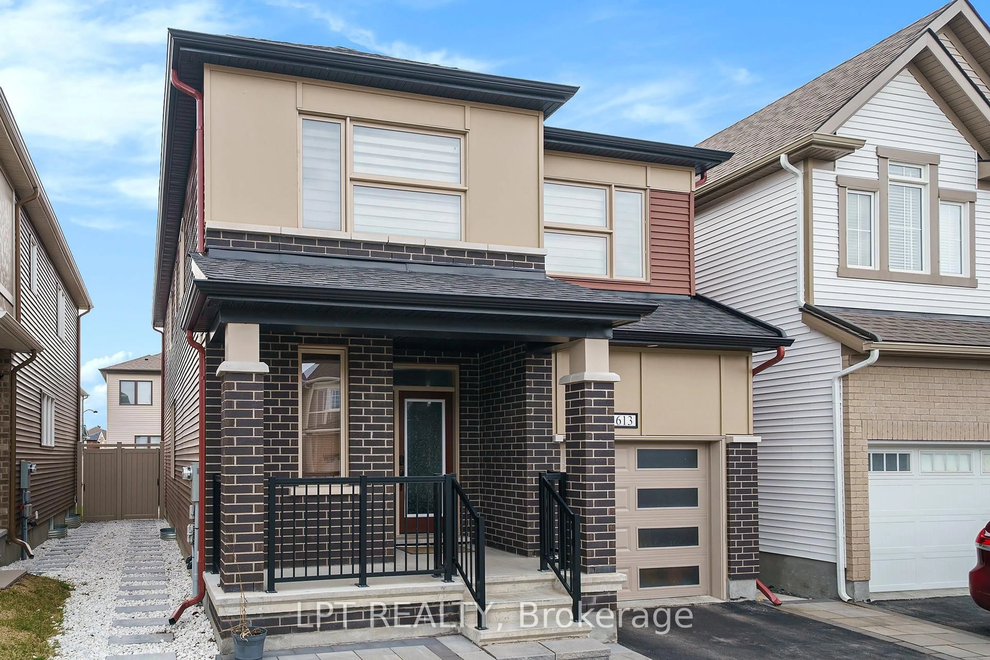 Home with brick exterior material, street for 613 Perseus Ave, Ottawa Ontario K2J 6S7