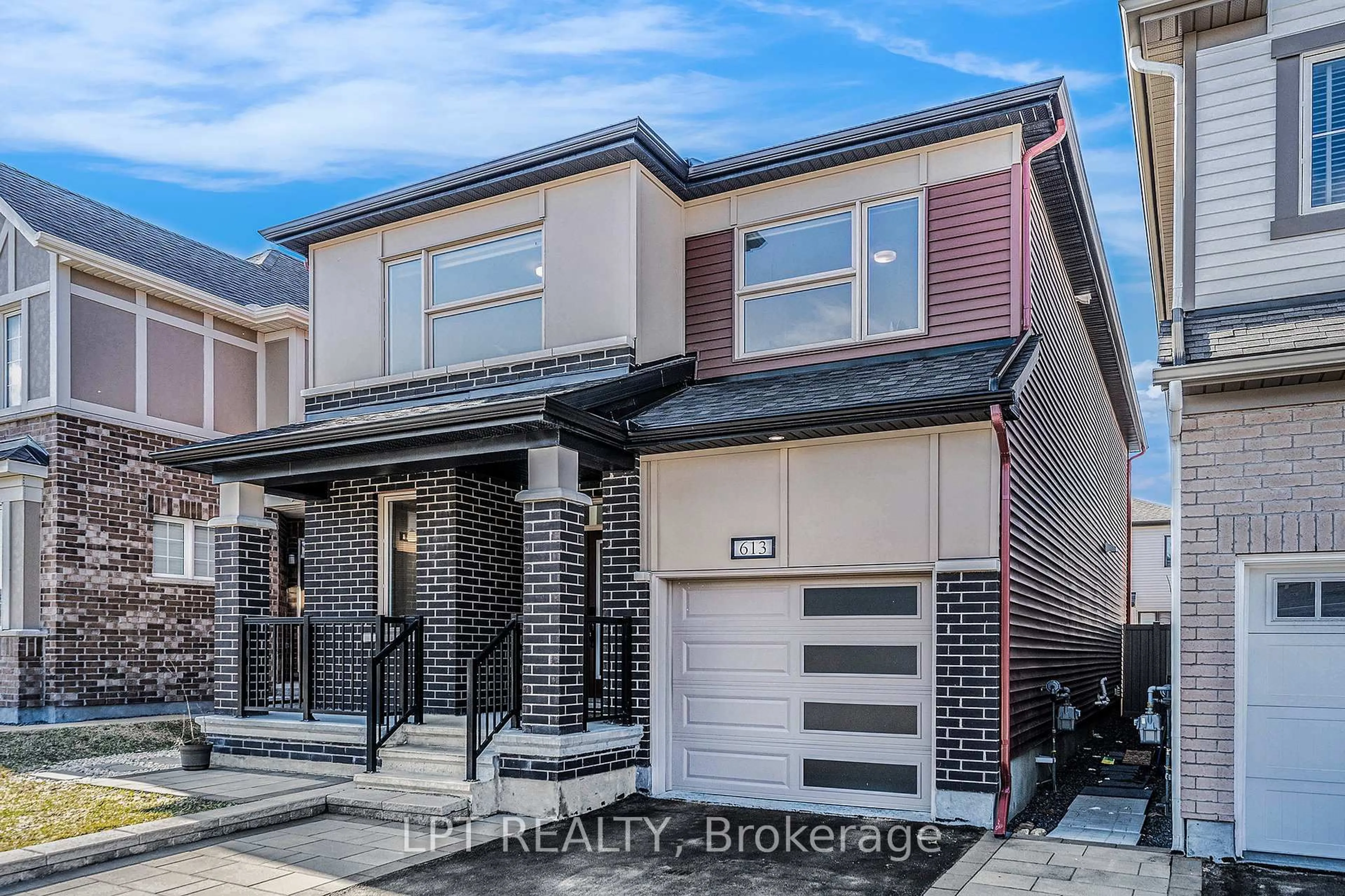 Home with brick exterior material, street for 613 Perseus Ave, Ottawa Ontario K2J 6S7