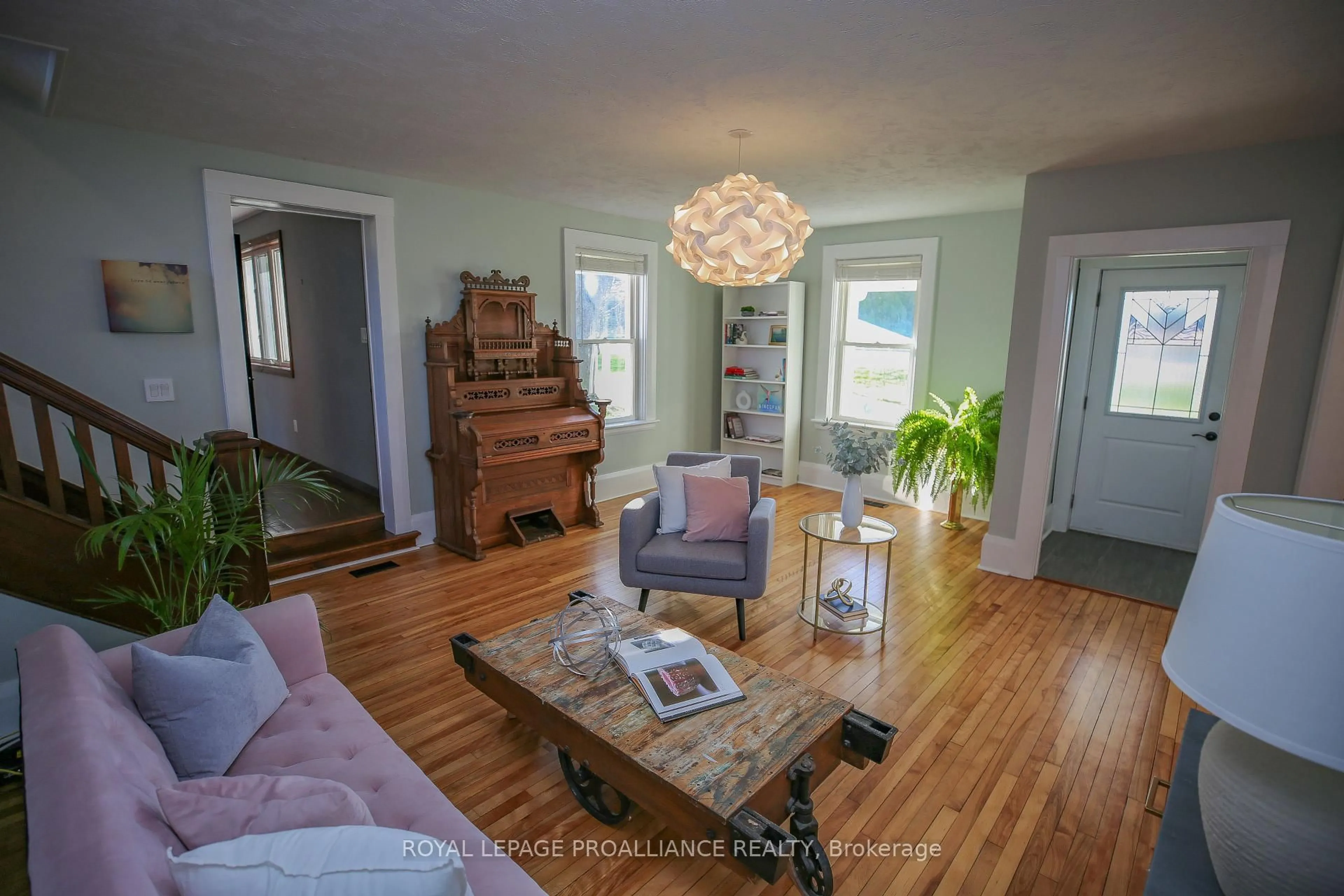 Living room with furniture, wood/laminate floor for 1379 County Road 2 Rd, Elizabethtown-Kitley Ontario K6V 5T3