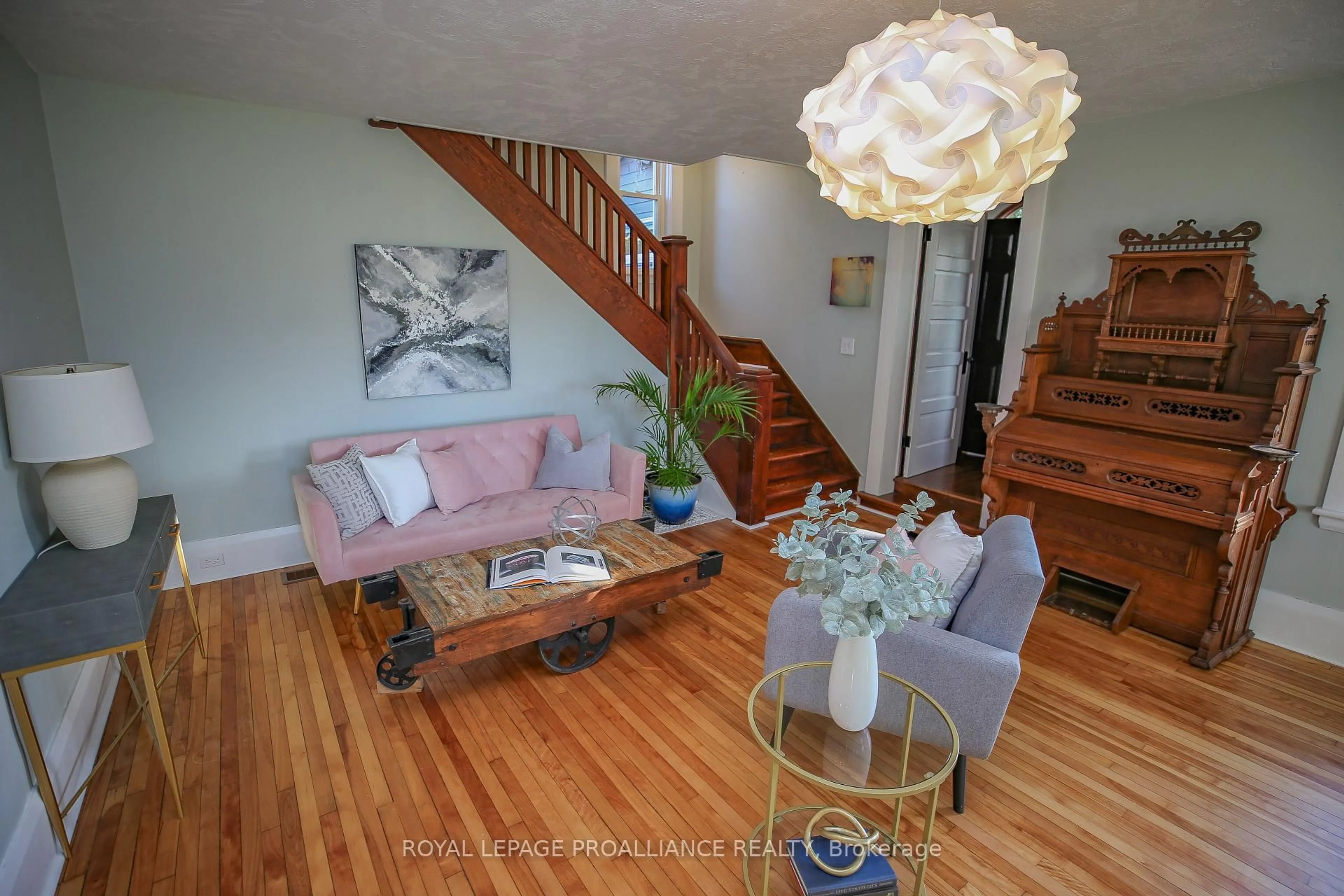 Living room with furniture, wood/laminate floor for 1379 County Road 2 Rd, Elizabethtown-Kitley Ontario K6V 5T3