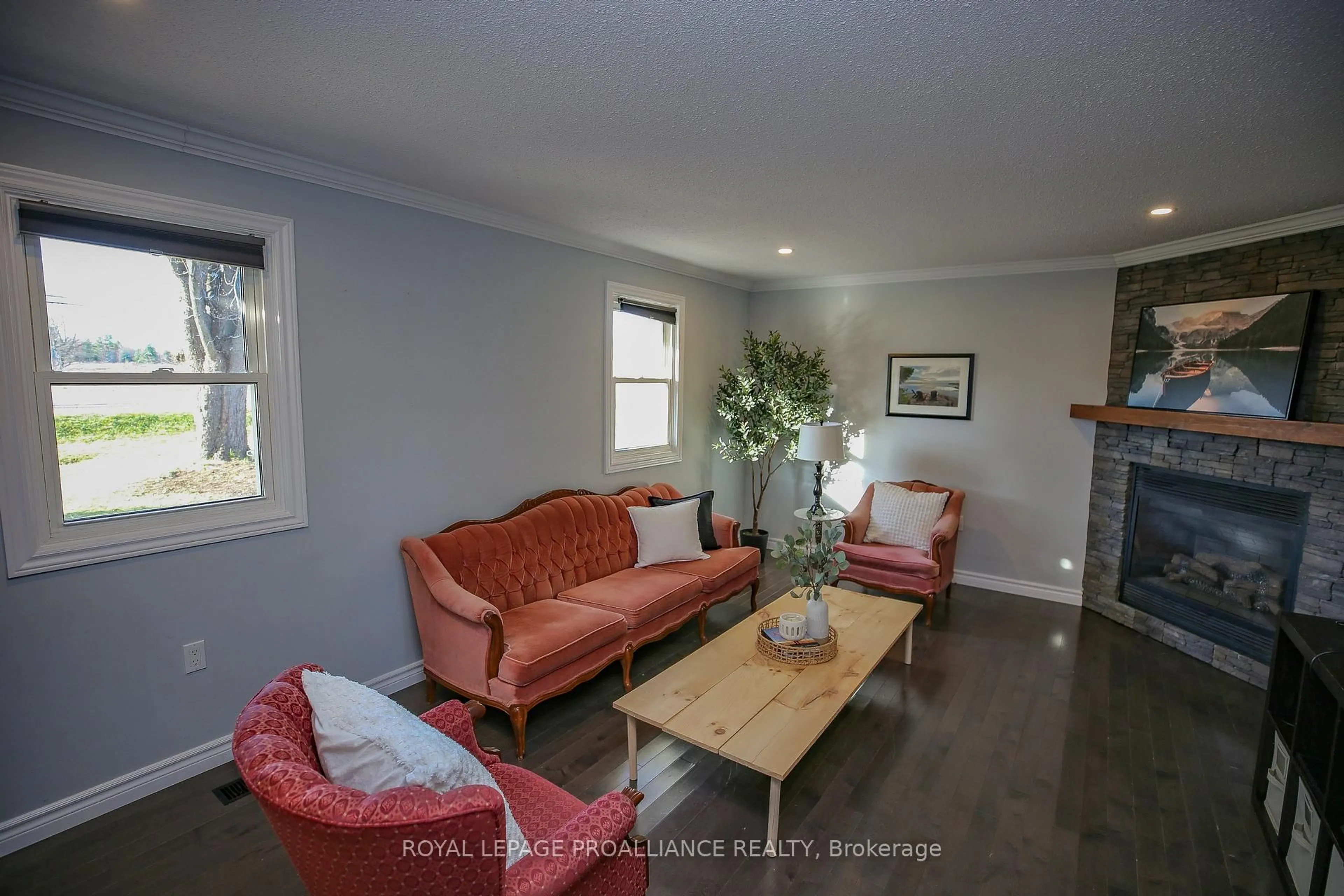 Living room with furniture, wood/laminate floor for 1379 County Road 2 Rd, Elizabethtown-Kitley Ontario K6V 5T3
