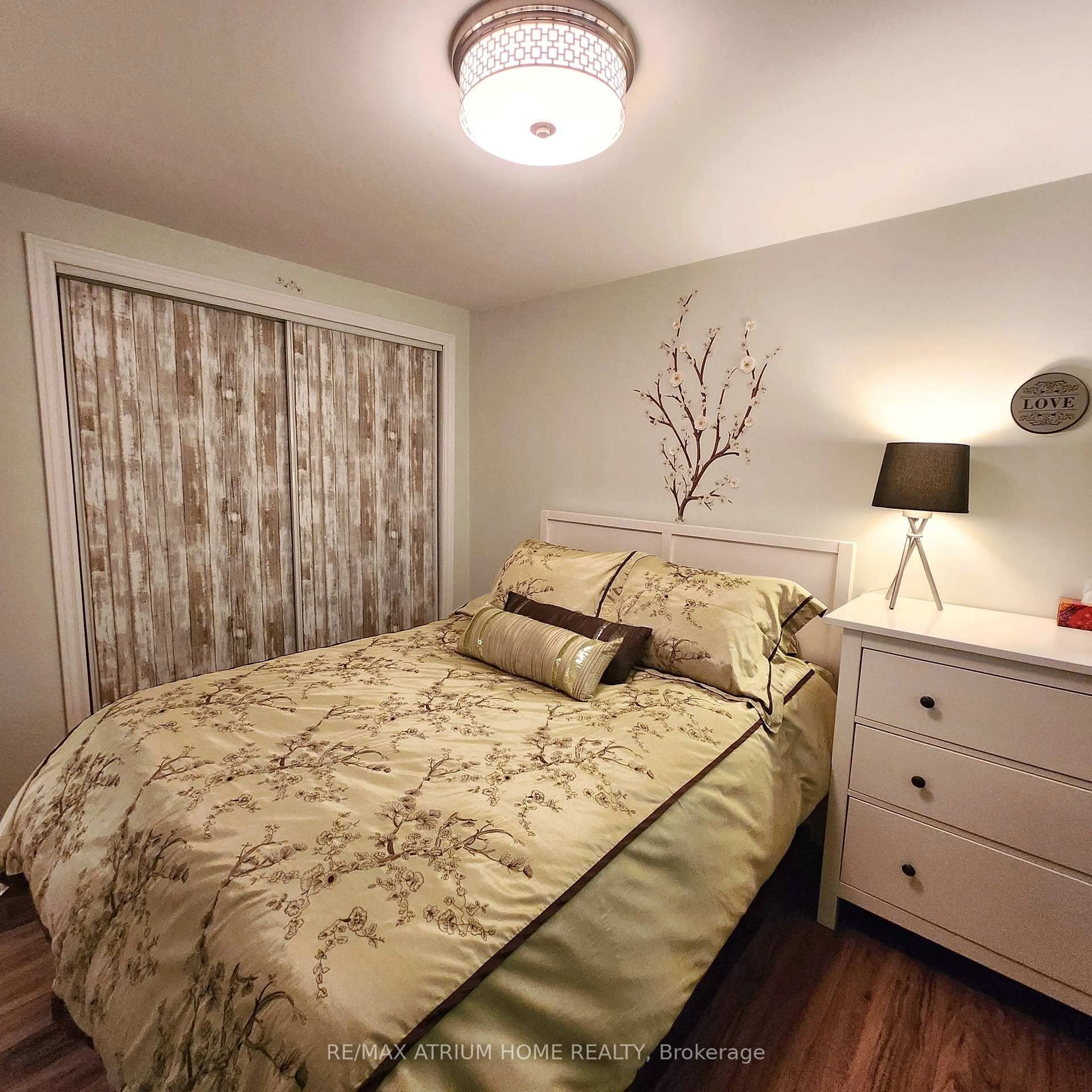 Bedroom with bed, wood/laminate floor for 825 Southview Dr, Otonabee-South Monaghan Ontario K0L 1B0