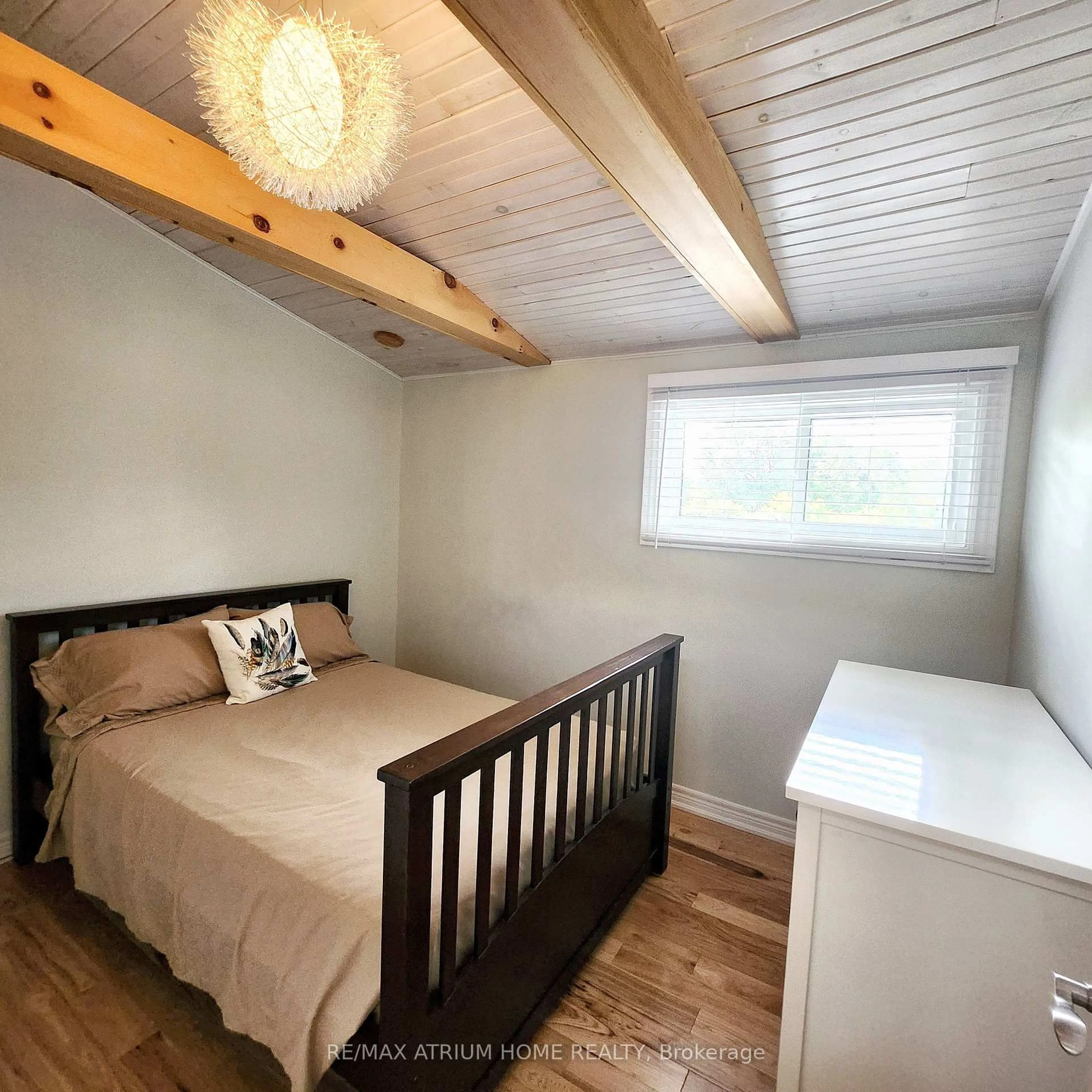 Bedroom with bed, wood/laminate floor for 825 Southview Dr, Otonabee-South Monaghan Ontario K0L 1B0