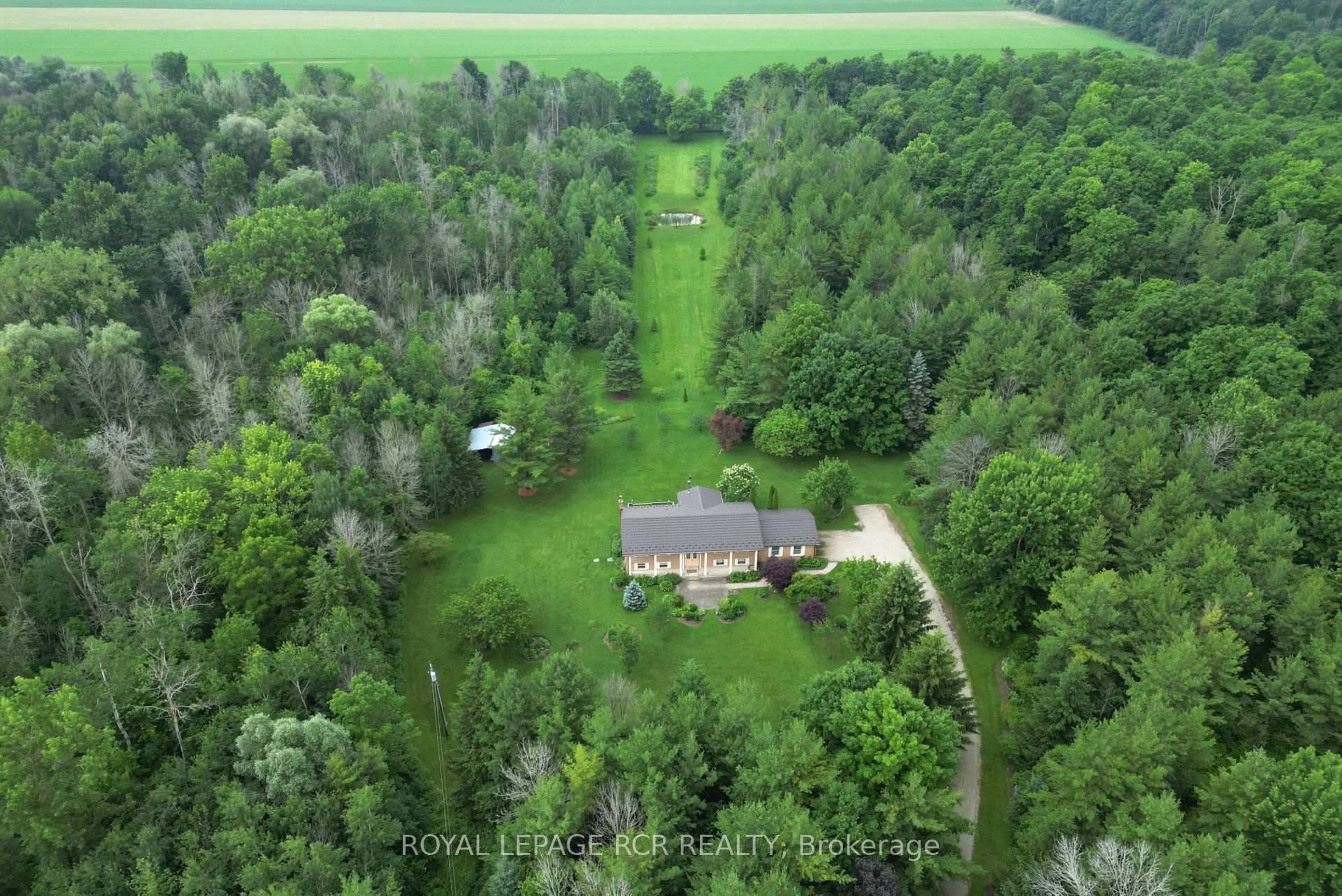 A pic from outside/outdoor area/front of a property/back of a property/a pic from drone, forest/trees view for 919 Guelph Rd, Centre Wellington Ontario N1M 3G5