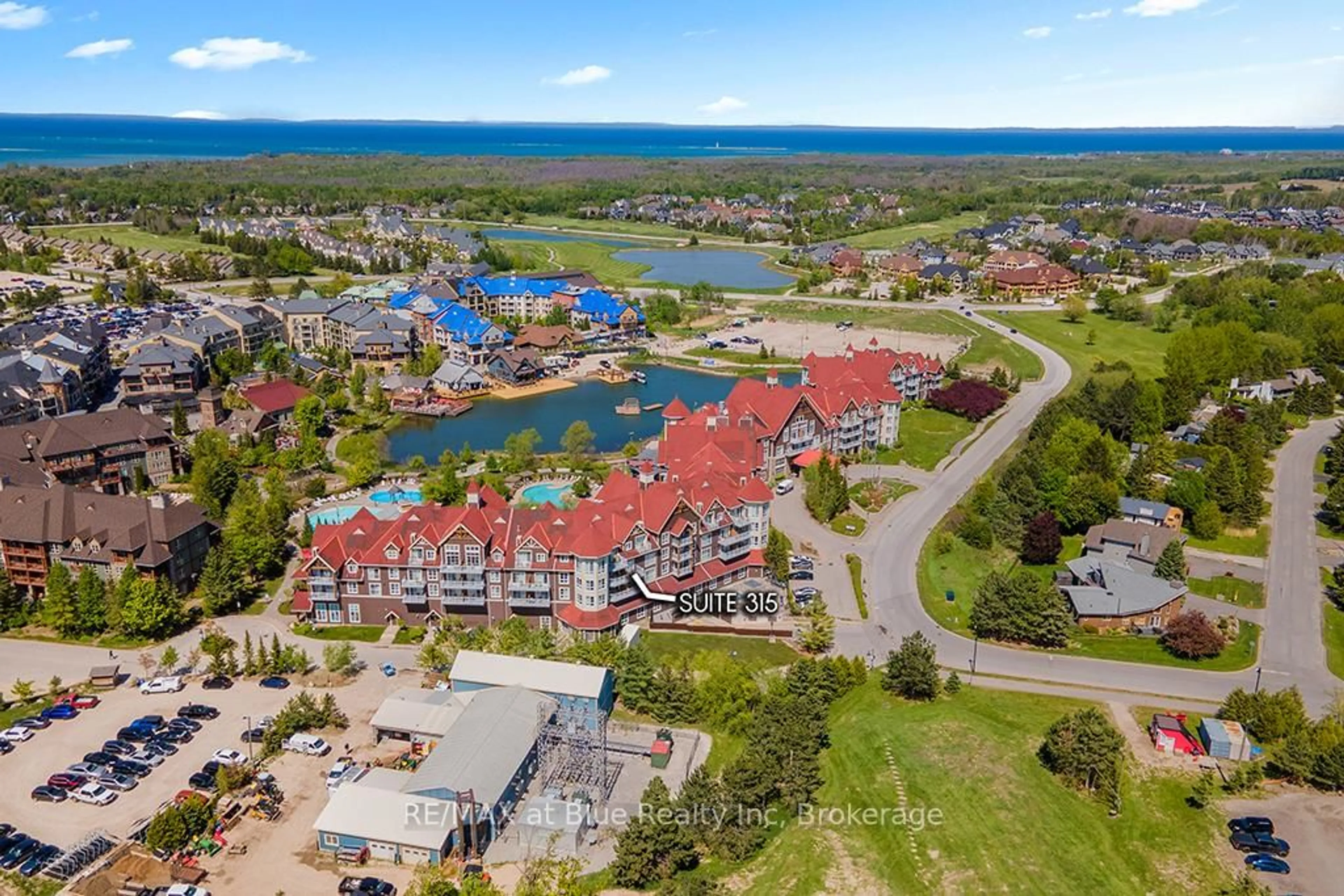 A pic from outside/outdoor area/front of a property/back of a property/a pic from drone, water/lake/river/ocean view for 220 Gord Canning Dr #315, Blue Mountains Ontario L9Y 0V2