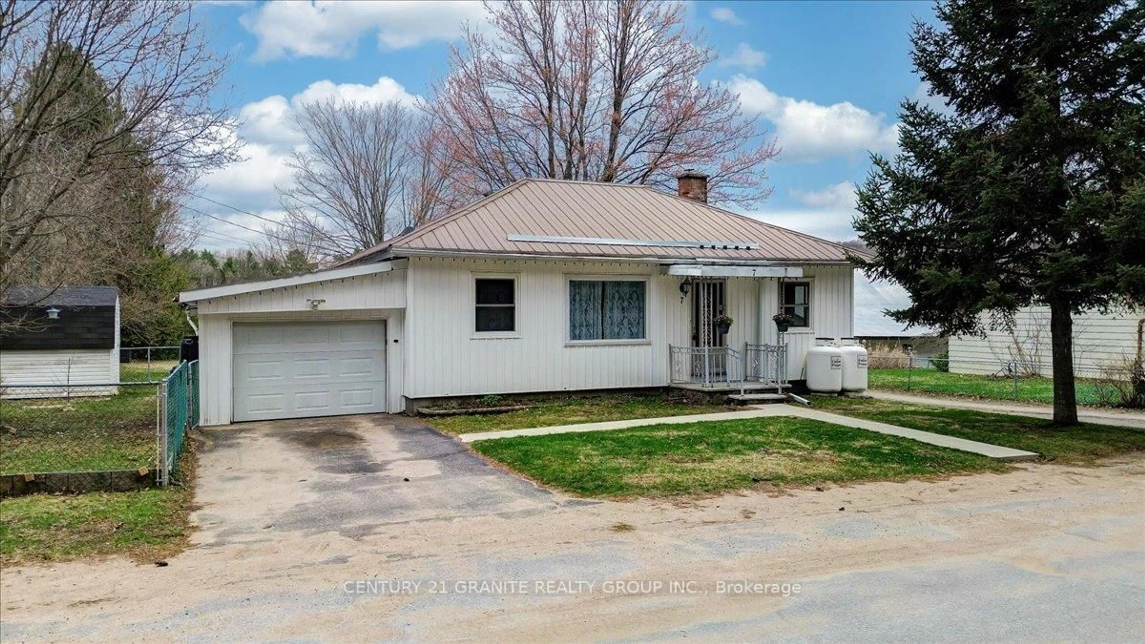 Home with vinyl exterior material, street for 7 Faraday St, Bancroft Ontario K0L 1C0