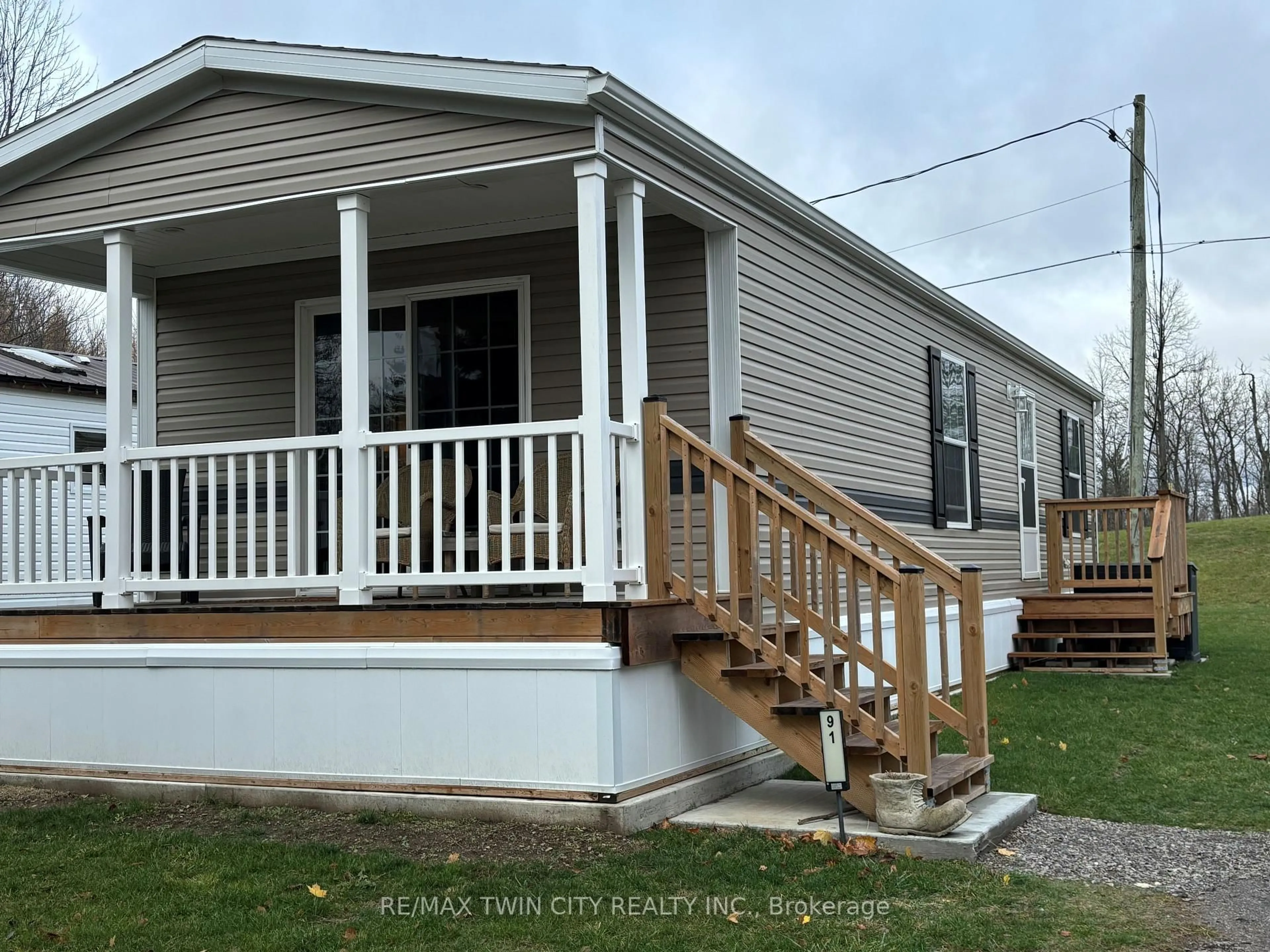 Home with vinyl exterior material, street for 1085 10th Concession Rd #91, Hamilton Ontario N0B 2J0