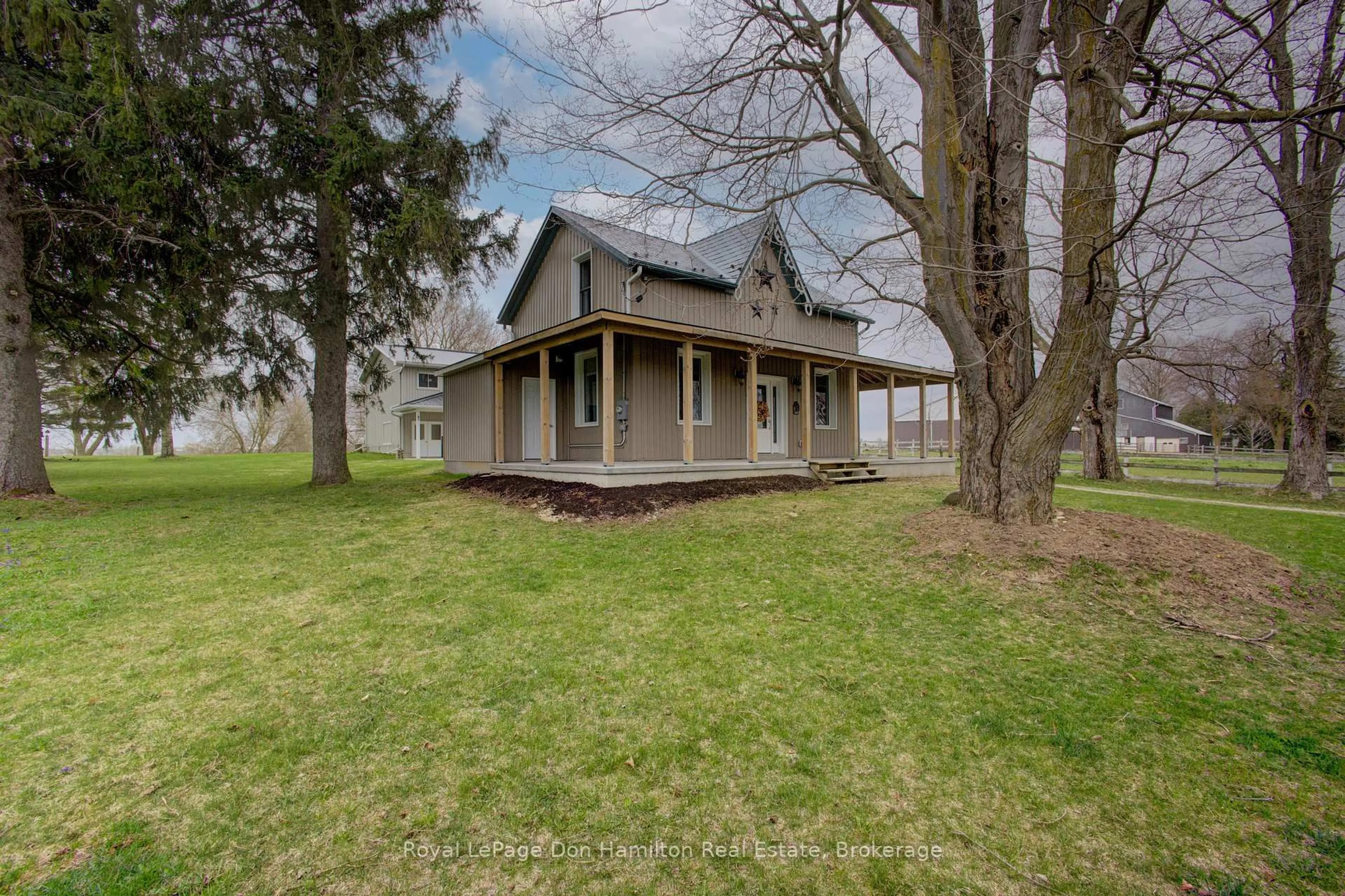 A pic from outside/outdoor area/front of a property/back of a property/a pic from drone, street for 6169 Wellington 109 Rd, Minto Ontario N0G 1Z0