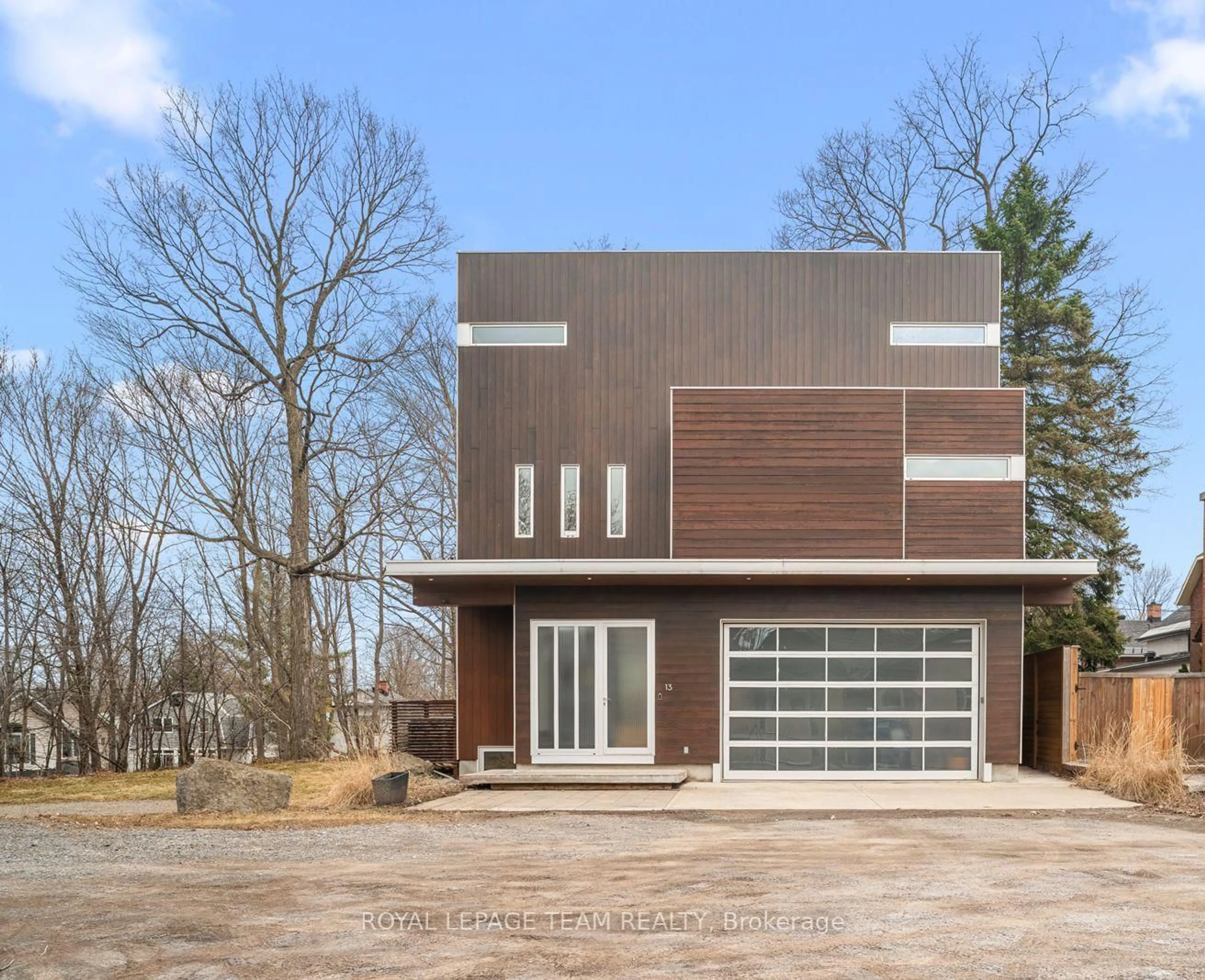 Home with brick exterior material, street for 13 Rockcliffe Way, Ottawa Ontario K1M 1B2