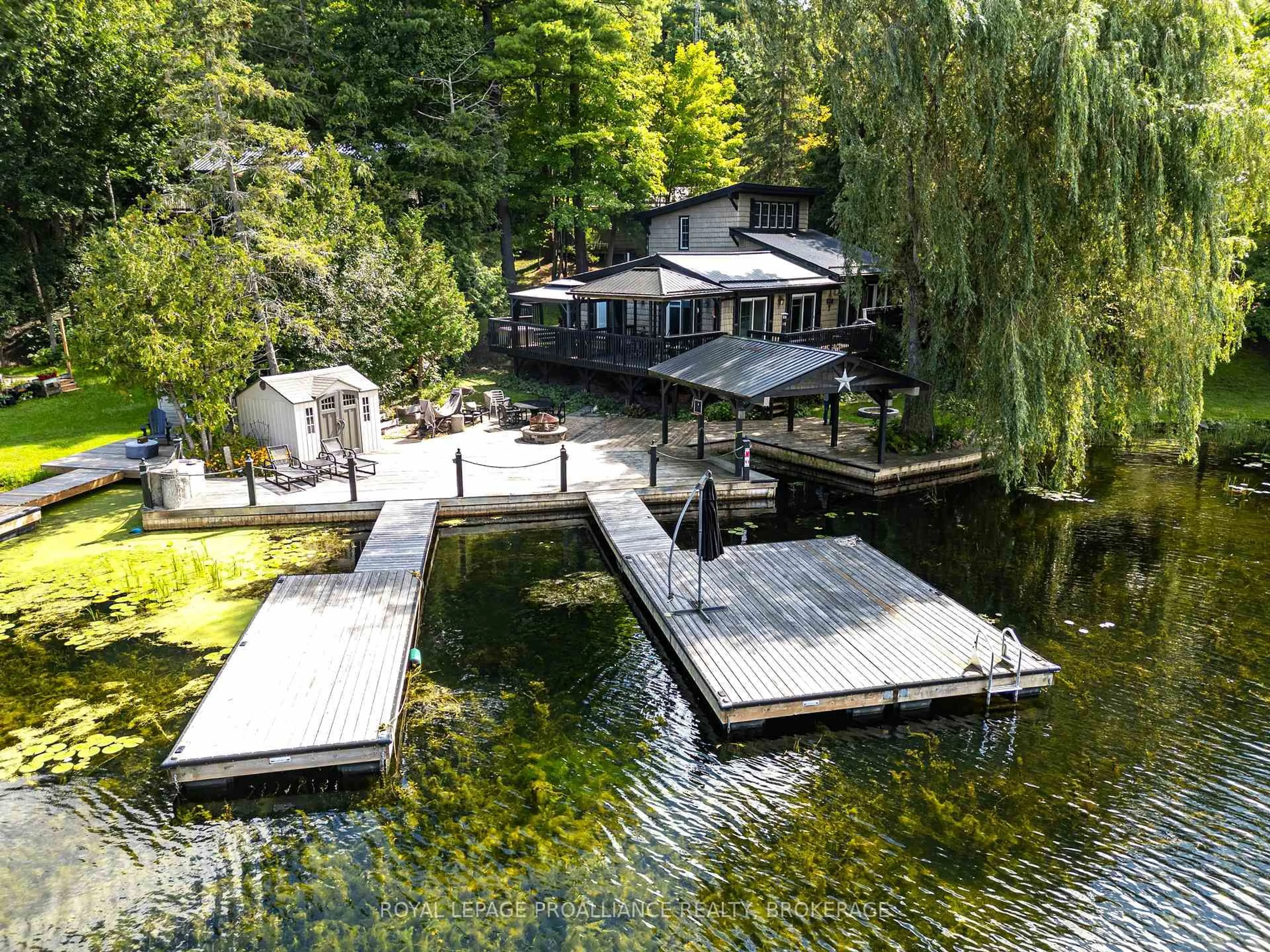 A pic from outside/outdoor area/front of a property/back of a property/a pic from drone, water/lake/river/ocean view for 915 Woodridge Lane, Leeds and the Thousand Islands Ontario K0E 1B0