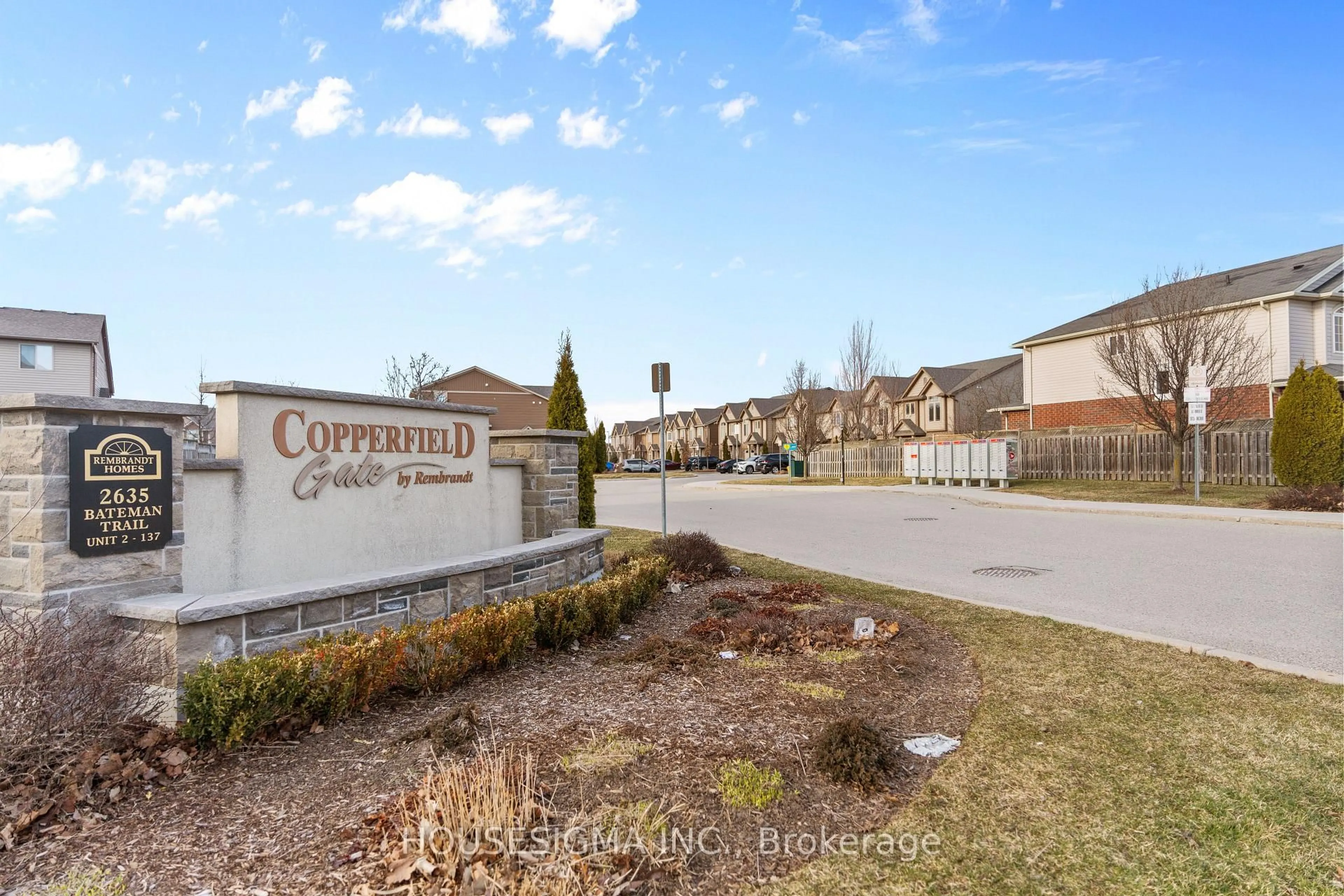 A pic from outside/outdoor area/front of a property/back of a property/a pic from drone, street for 2635 Bateman Tr #12, London South Ontario N6L 0C1
