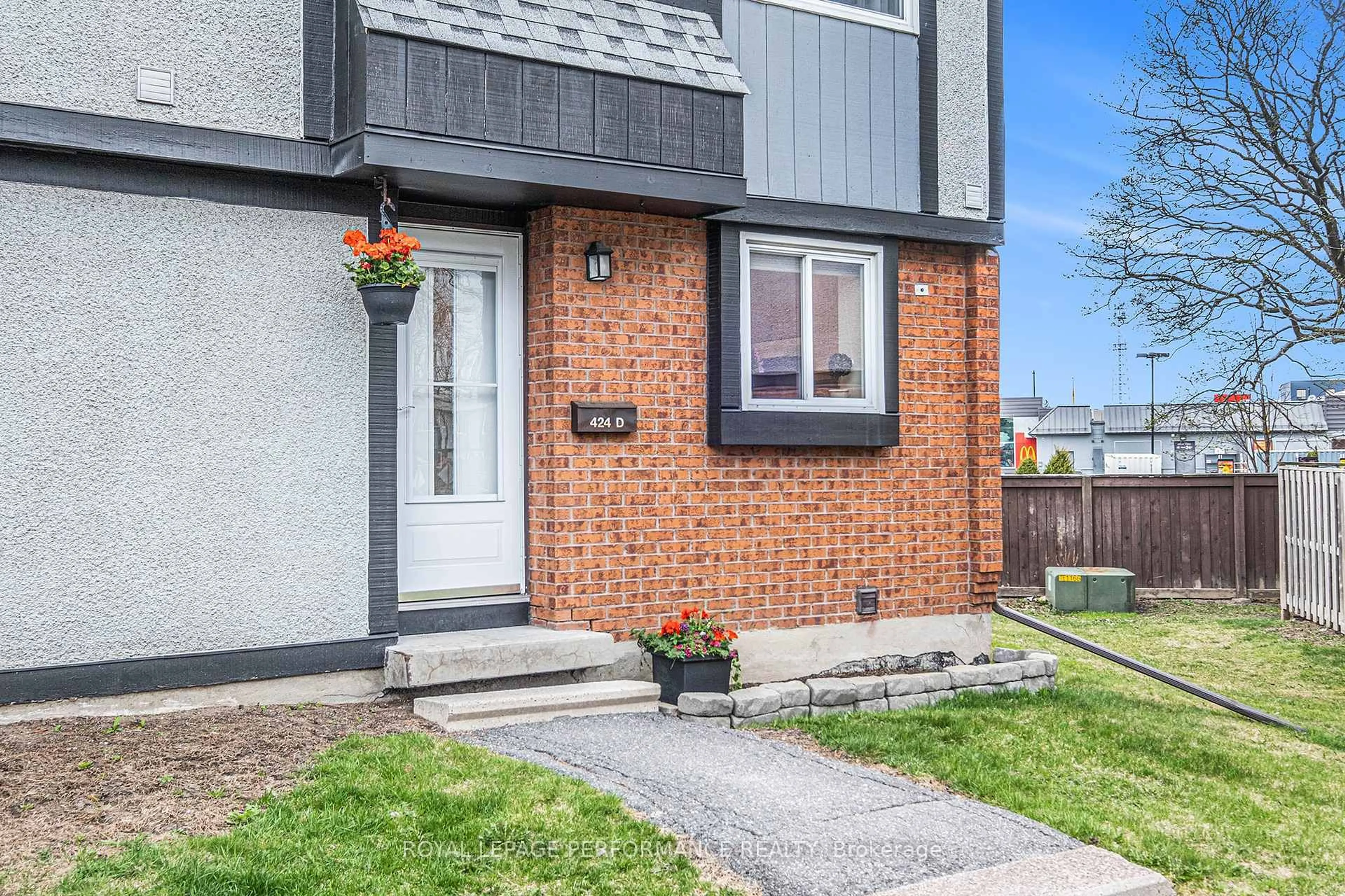 Home with brick exterior material, street for 424 Moodie Dr #D, Ottawa Ontario K2H 8A6