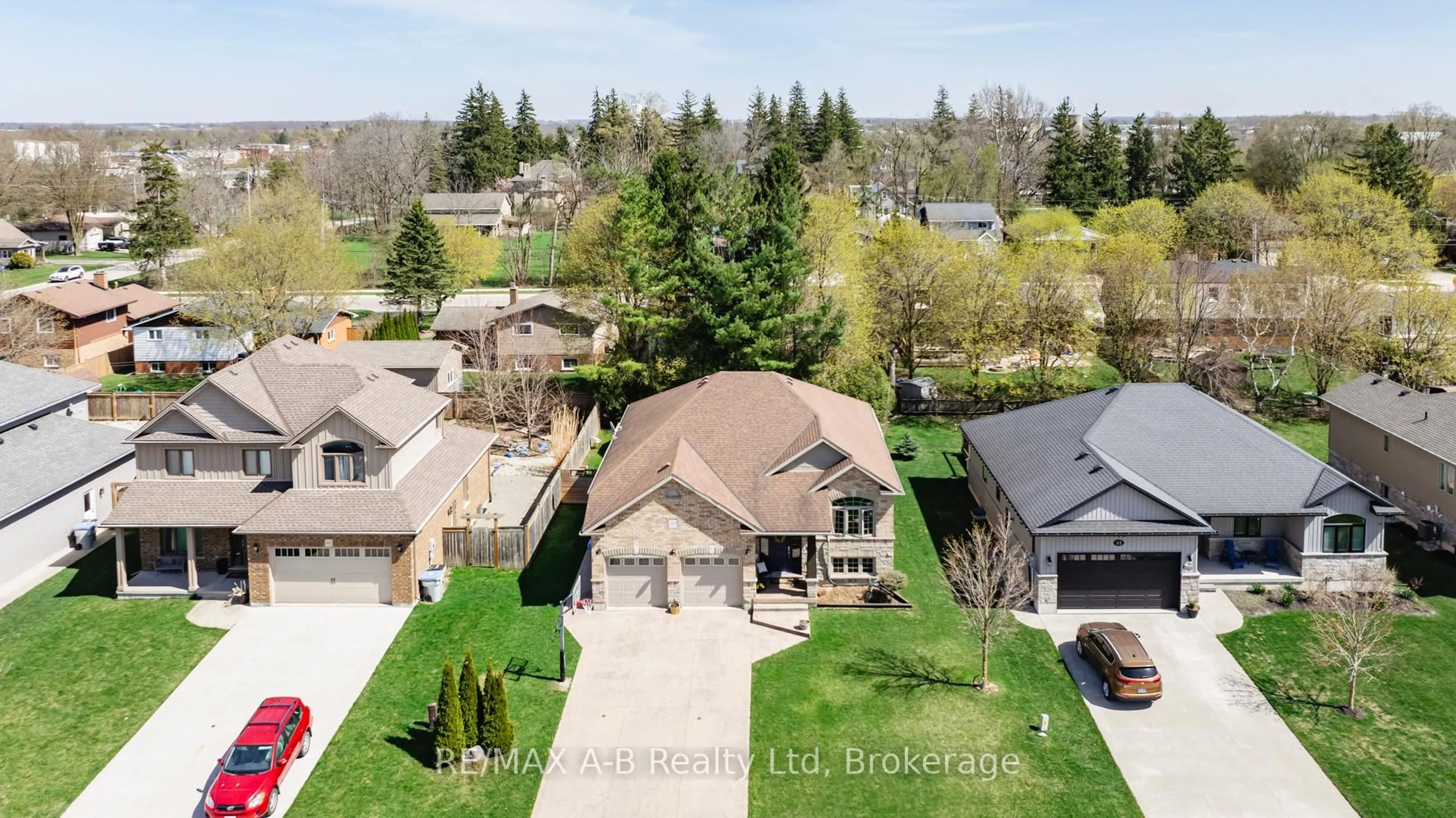 A pic from outside/outdoor area/front of a property/back of a property/a pic from drone, street for 83 Sylvia St, West Perth Ontario N0K 1N0