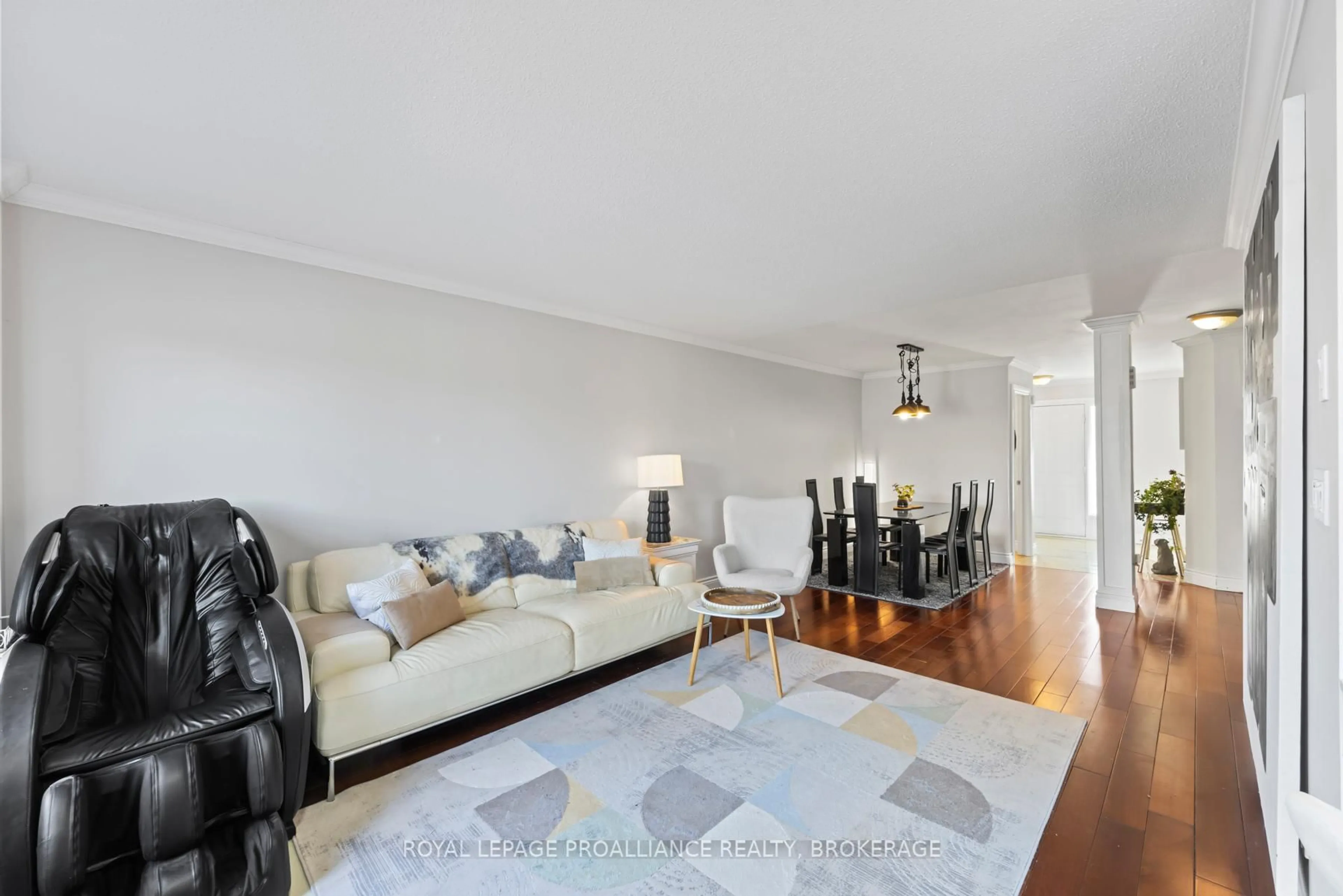 Living room with furniture, wood/laminate floor for 1098 King St #29, Kingston Ontario K7M 8J1
