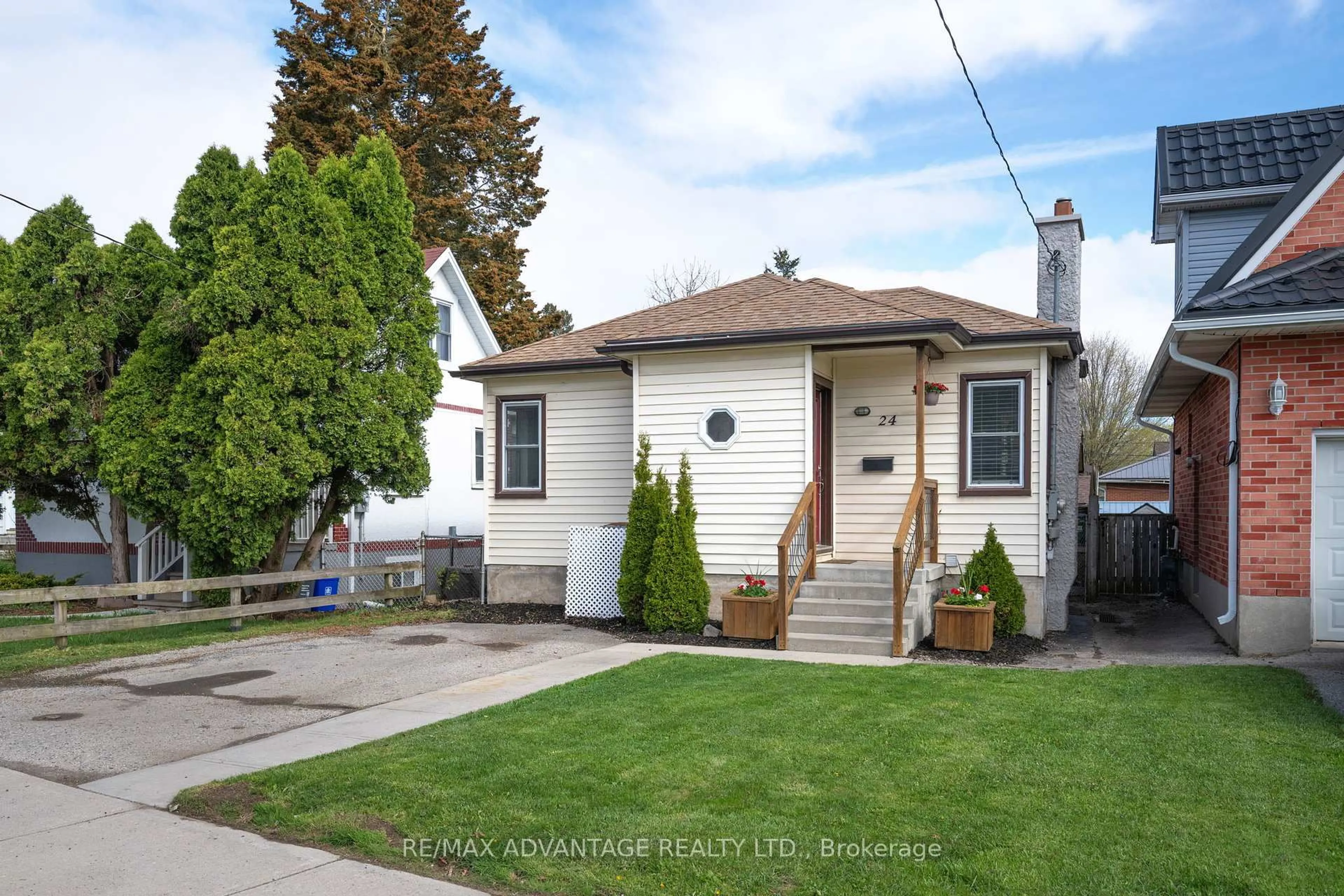 Home with vinyl exterior material, street for 24 Emery St, London South Ontario N6J 1R4
