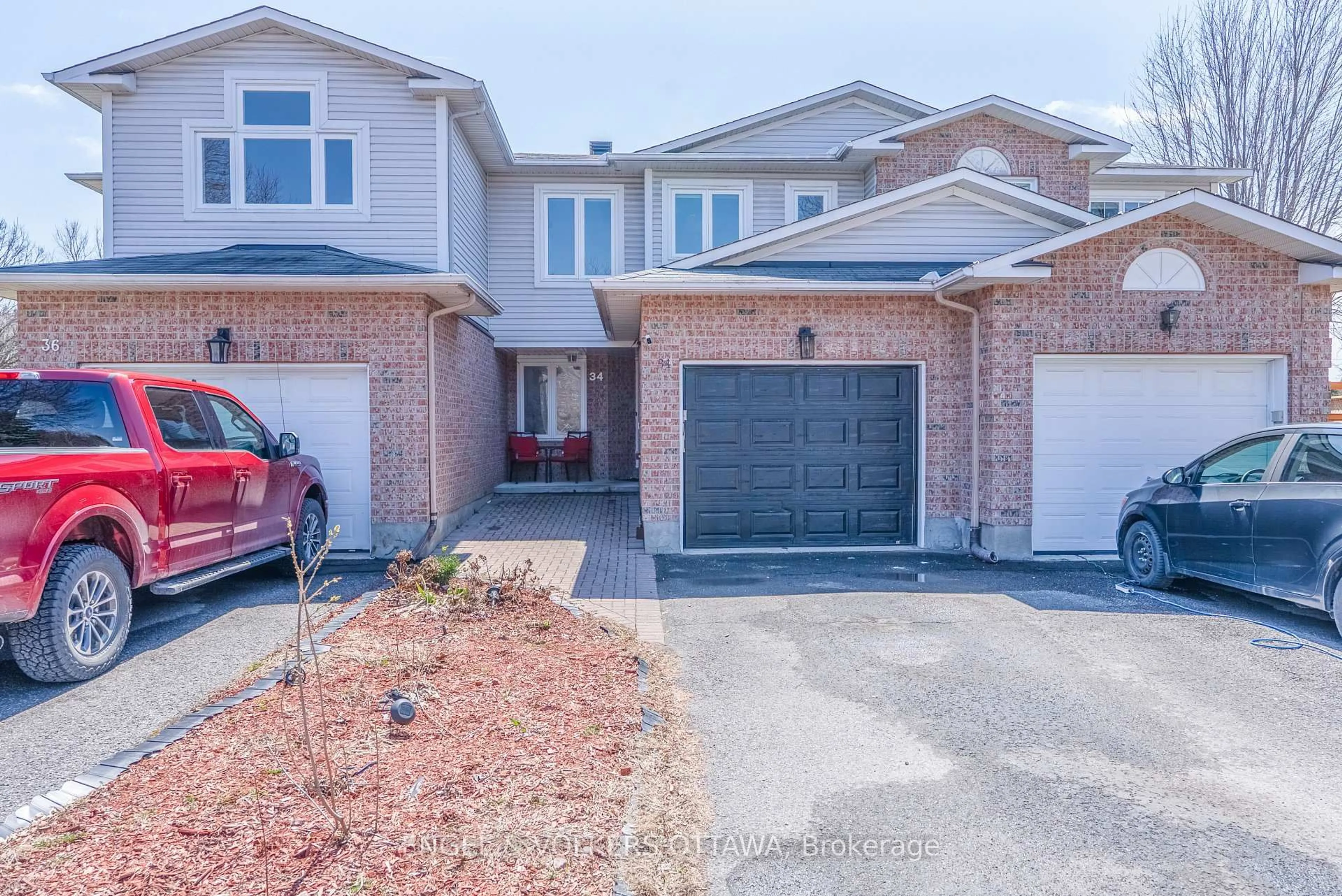 Home with brick exterior material, street for 34 Baton Crt, Kanata Ontario K2L 4C8