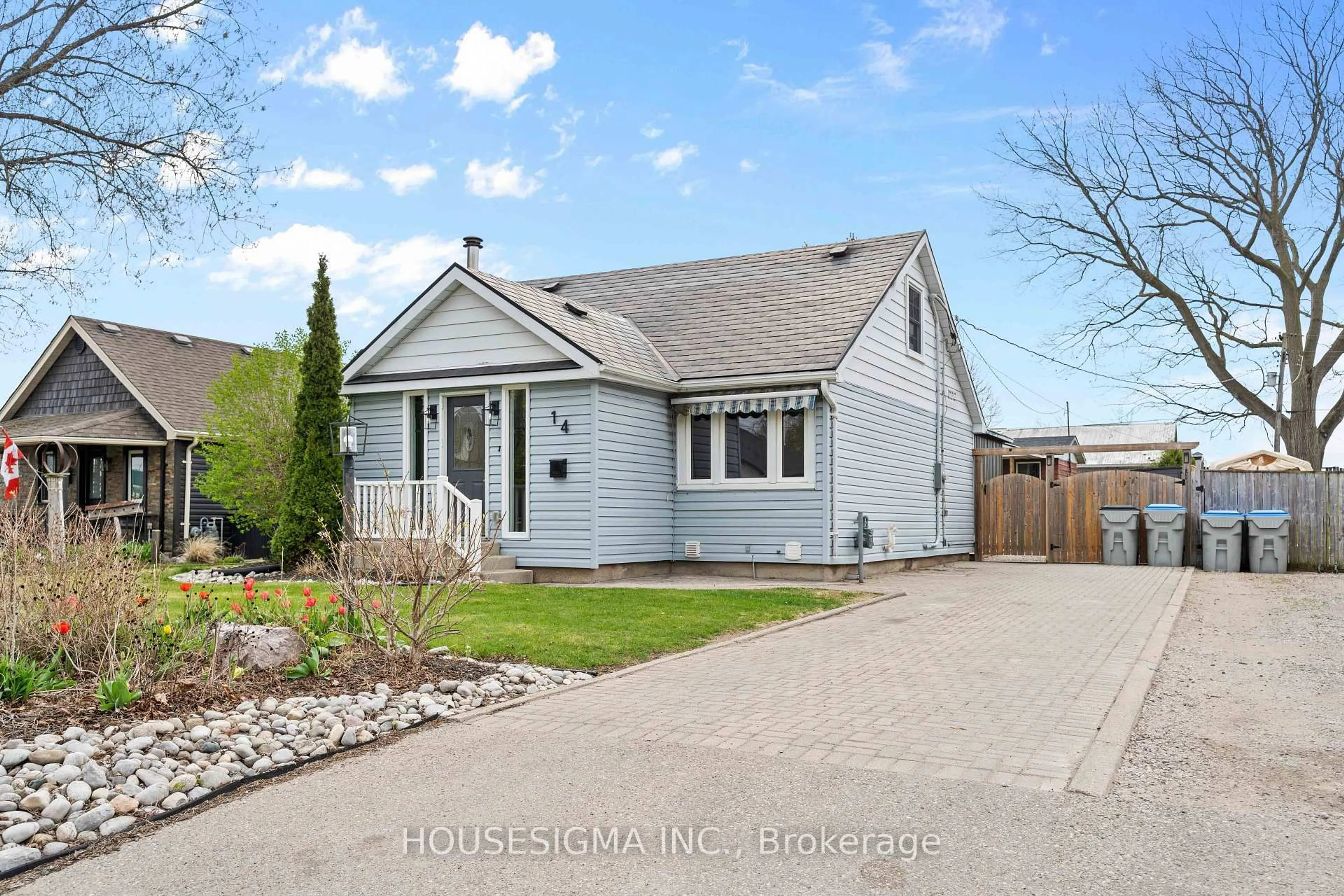 Home with vinyl exterior material, street for 14 Carroll St, Strathroy Caradoc Ontario N7G 1A8