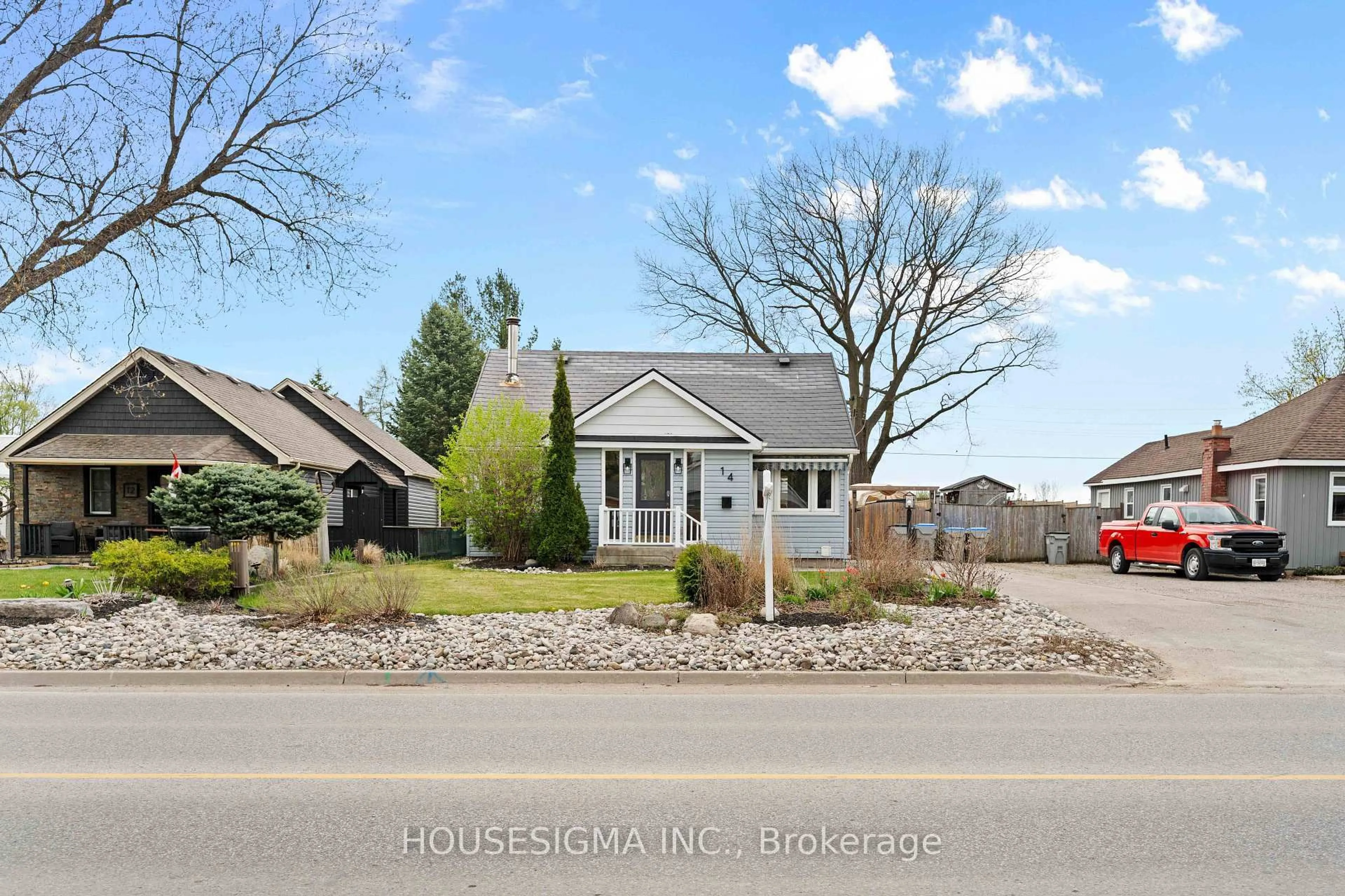 Home with vinyl exterior material, street for 14 Carroll St, Strathroy Caradoc Ontario N7G 1A8
