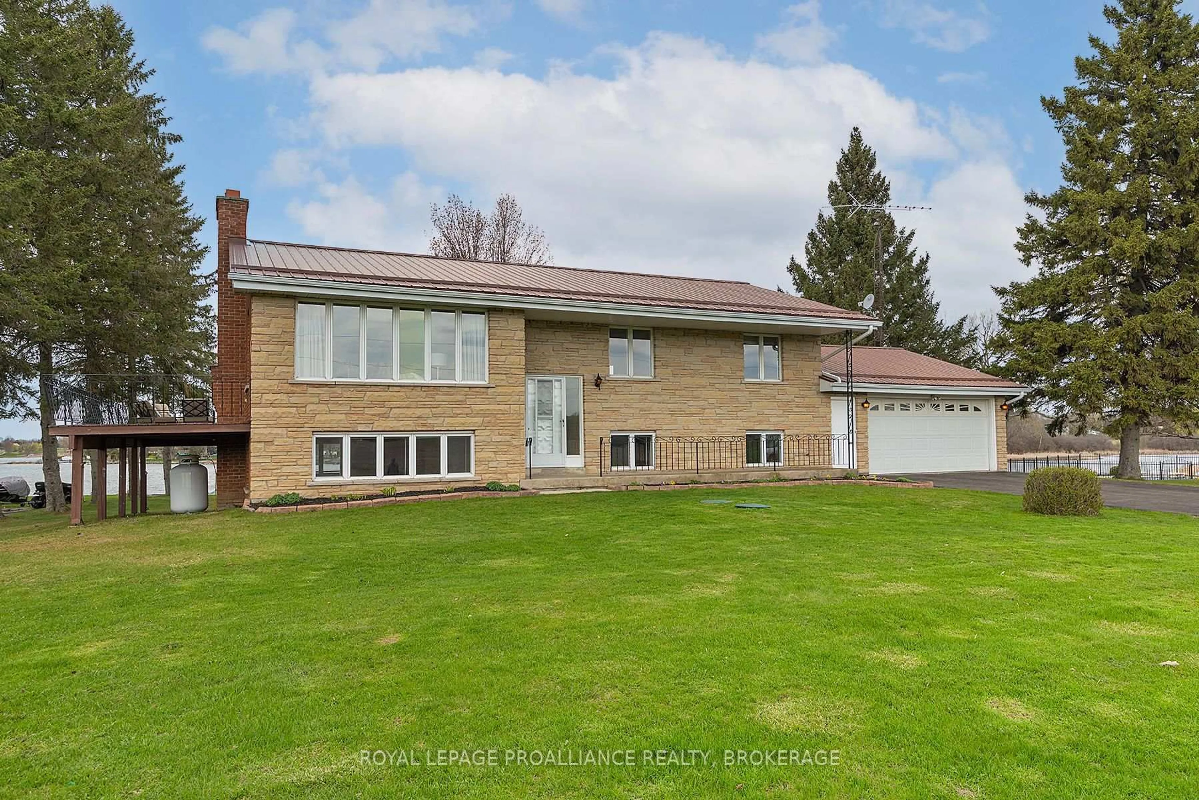 Home with brick exterior material, street for 143 Clark Dr, Front of Leeds & Seeleys Bay Ontario K7G 2V5