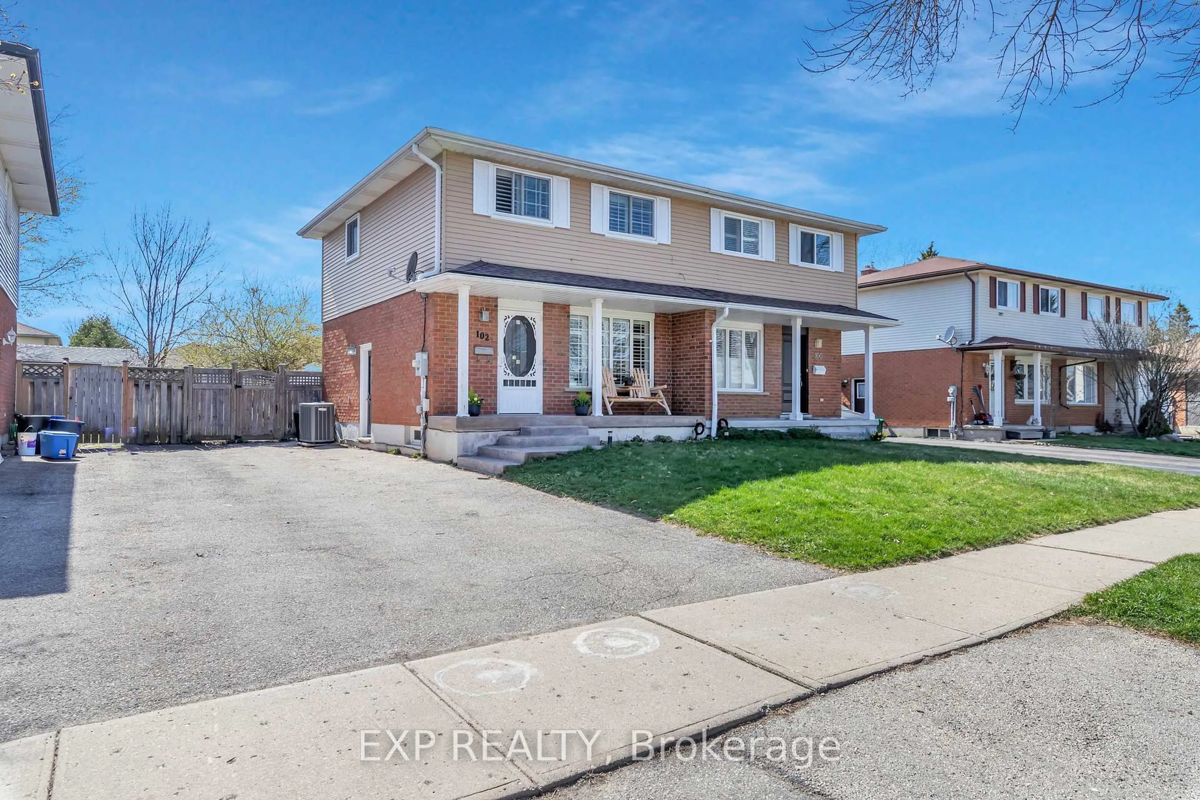 Home with brick exterior material, street for 102 Connelly Dr, Kitchener Ontario N2N 2V2