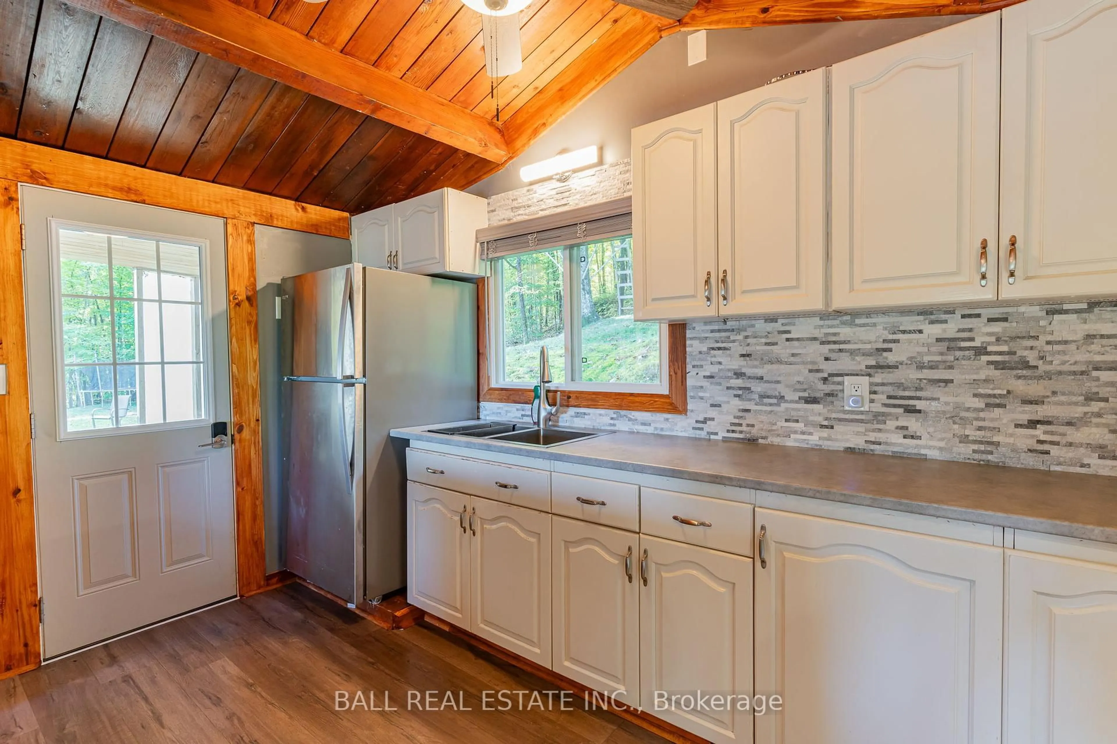 Open concept kitchen, wood/laminate floor for 19181 Highway 35 N/A, Algonquin Highlands Ontario K0M 1S0