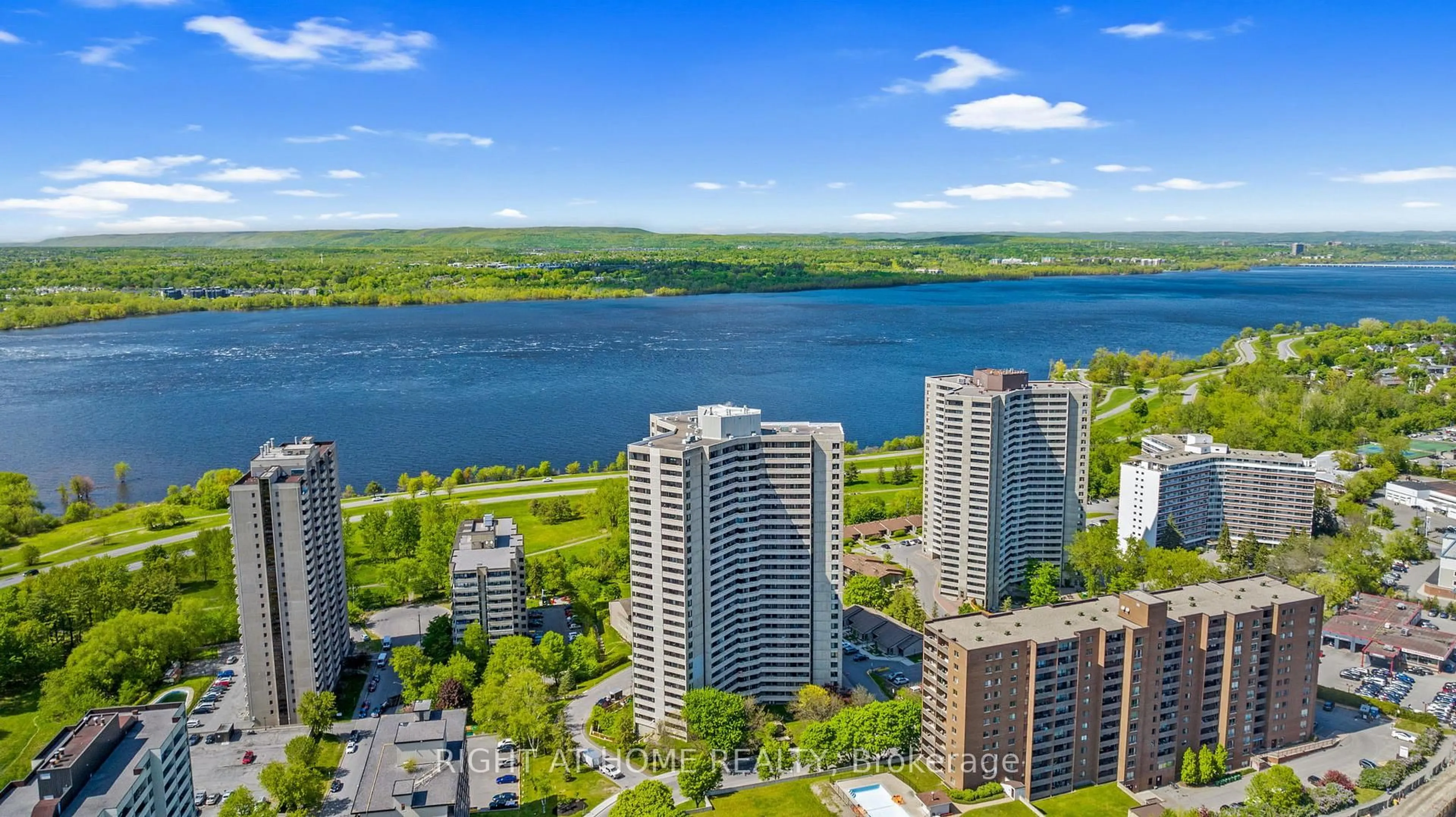 A pic from outside/outdoor area/front of a property/back of a property/a pic from drone, water/lake/river/ocean view for 1171 AMBLESIDE Dr #906, Ottawa Ontario K2B 8C8