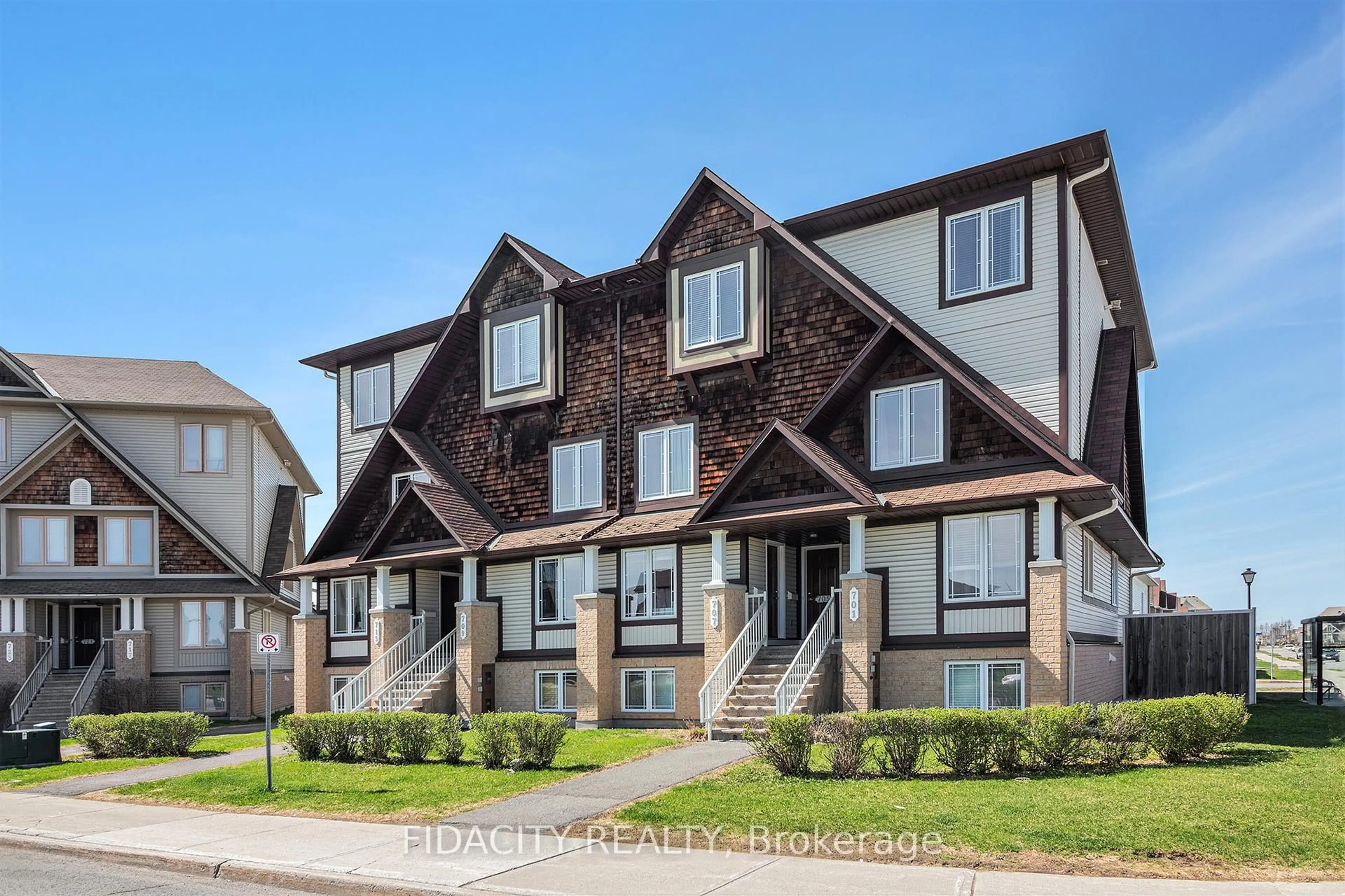 Home with vinyl exterior material, street for 711 Lakeridge Dr #3, Ottawa Ontario K4A 0N5