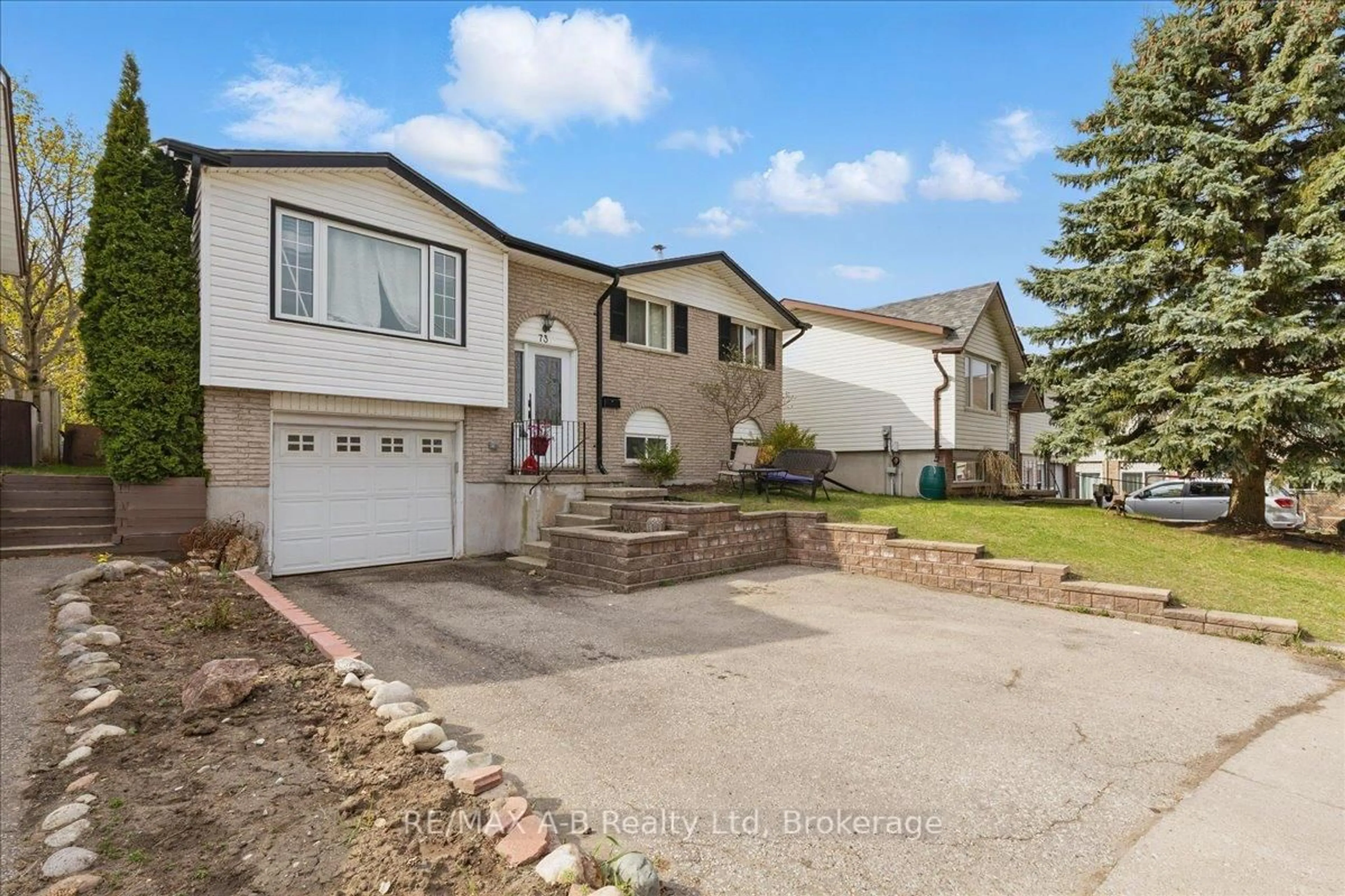 Home with vinyl exterior material, street for 73 Southwood Dr, Kitchener Ontario N2E 2E6