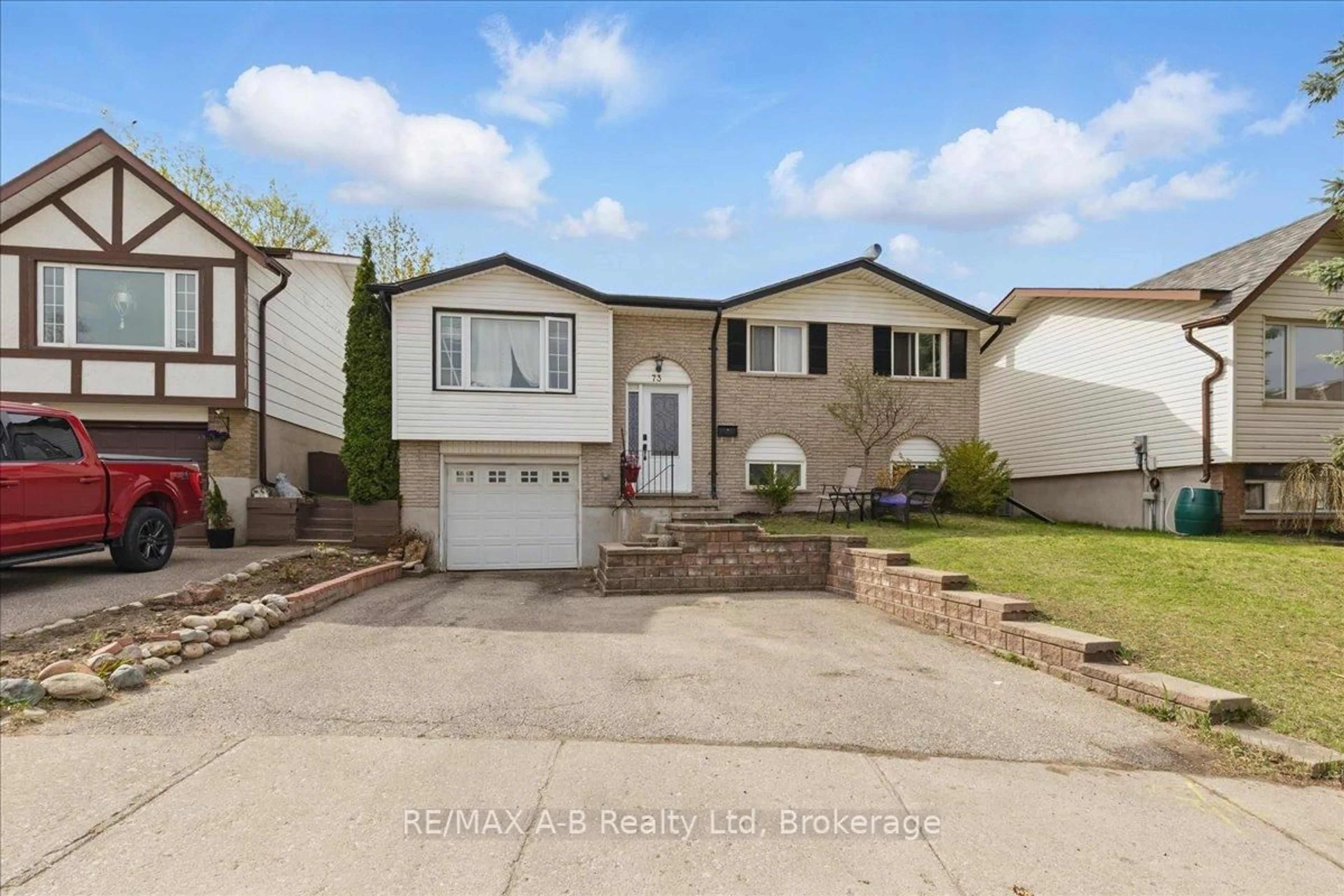 Home with vinyl exterior material, street for 73 Southwood Dr, Kitchener Ontario N2E 2E6