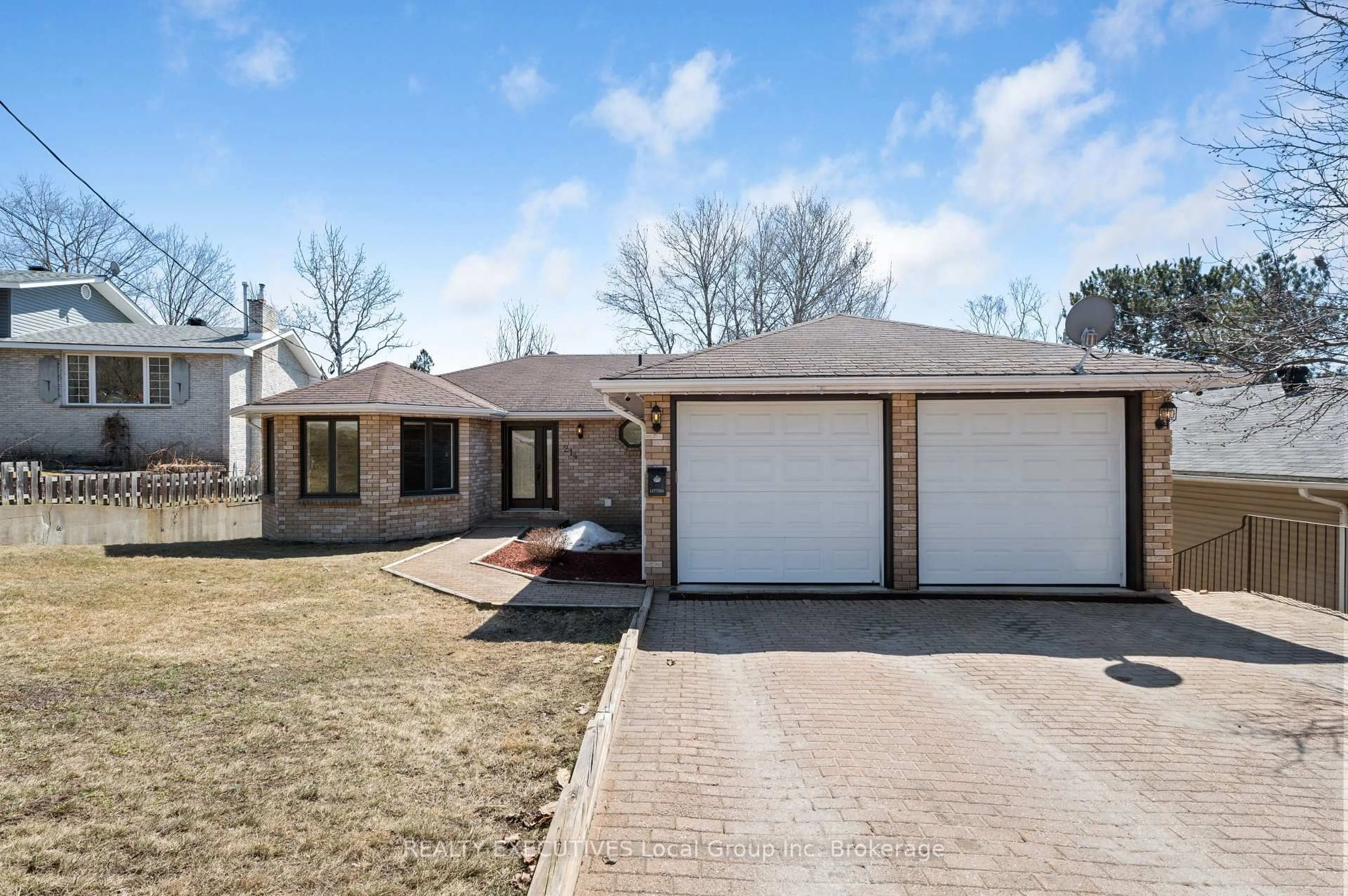 Home with brick exterior material, street for 214 LEONARD St, North Bay Ontario P1B 5K2