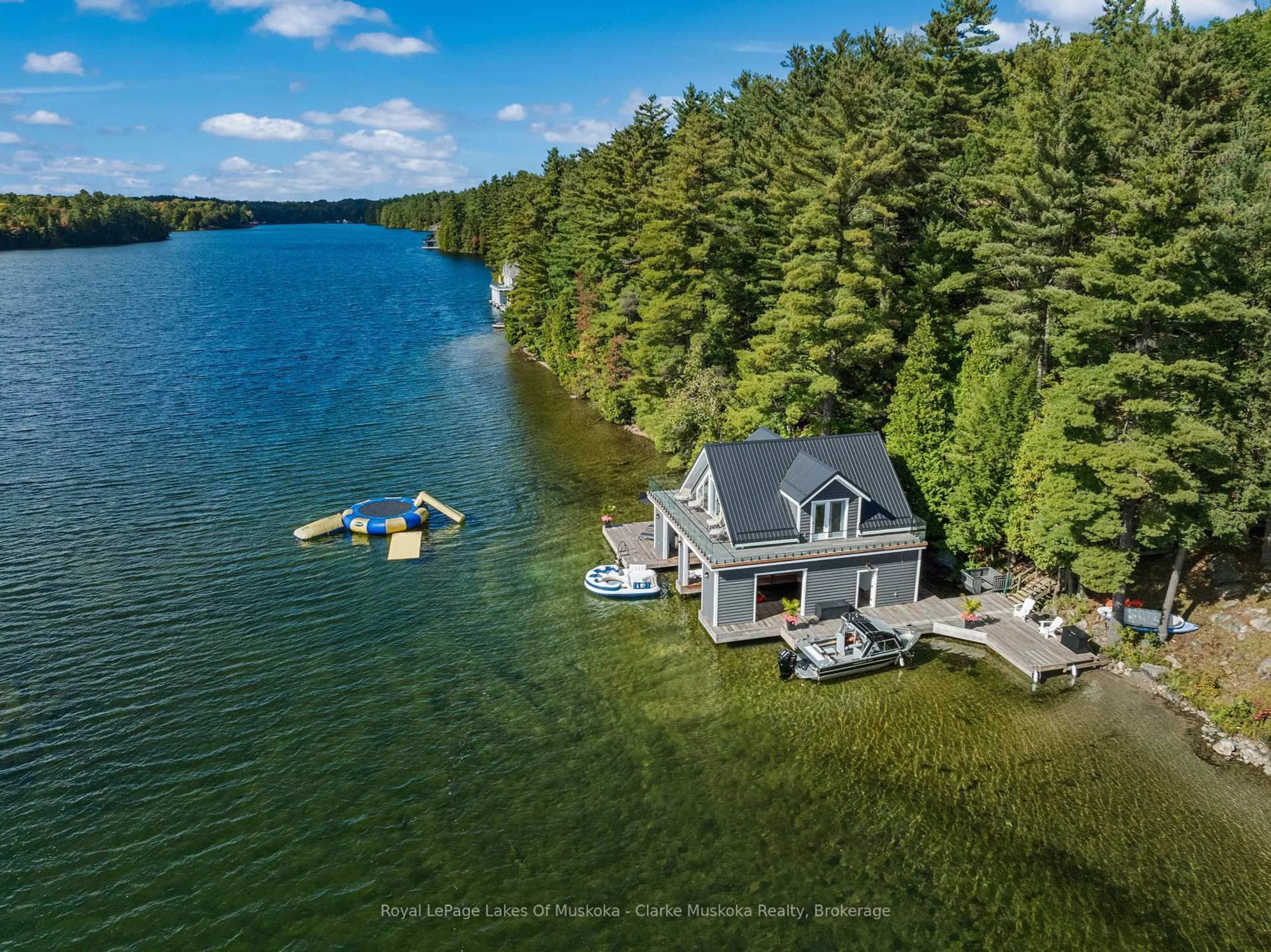 A pic from outside/outdoor area/front of a property/back of a property/a pic from drone, water/lake/river/ocean view for 22 PLAYFAIR Island #3, Seguin Ontario P0C 1H0