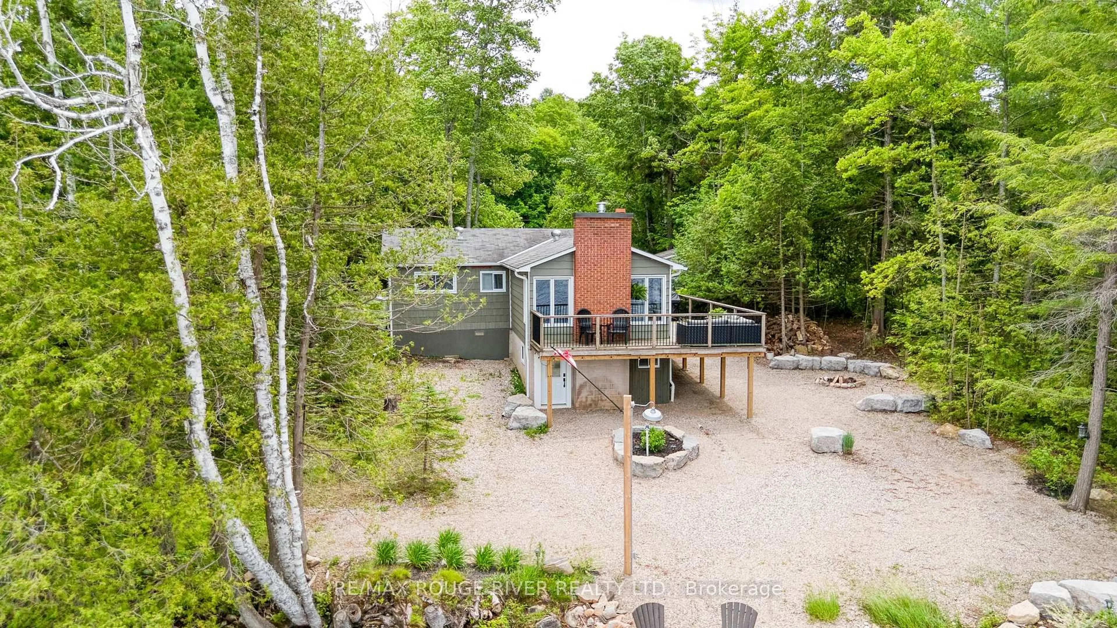 A pic from outside/outdoor area/front of a property/back of a property/a pic from drone, forest/trees view for 1039 West Cottage Dr, Ompah Ontario K0H 2J0