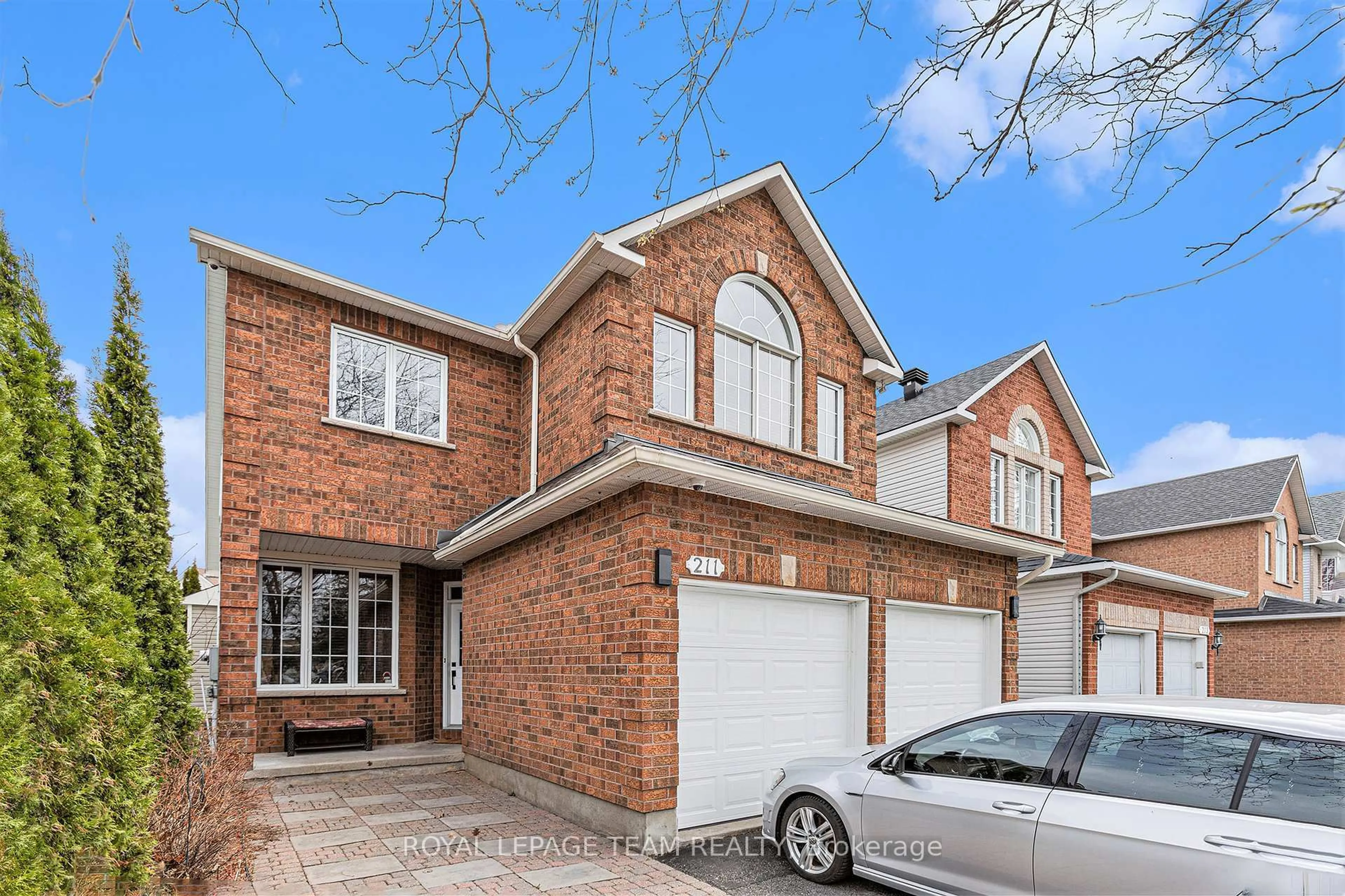 Home with brick exterior material, street for 211 STONEWAY Dr, Ottawa Ontario K2G 6R2