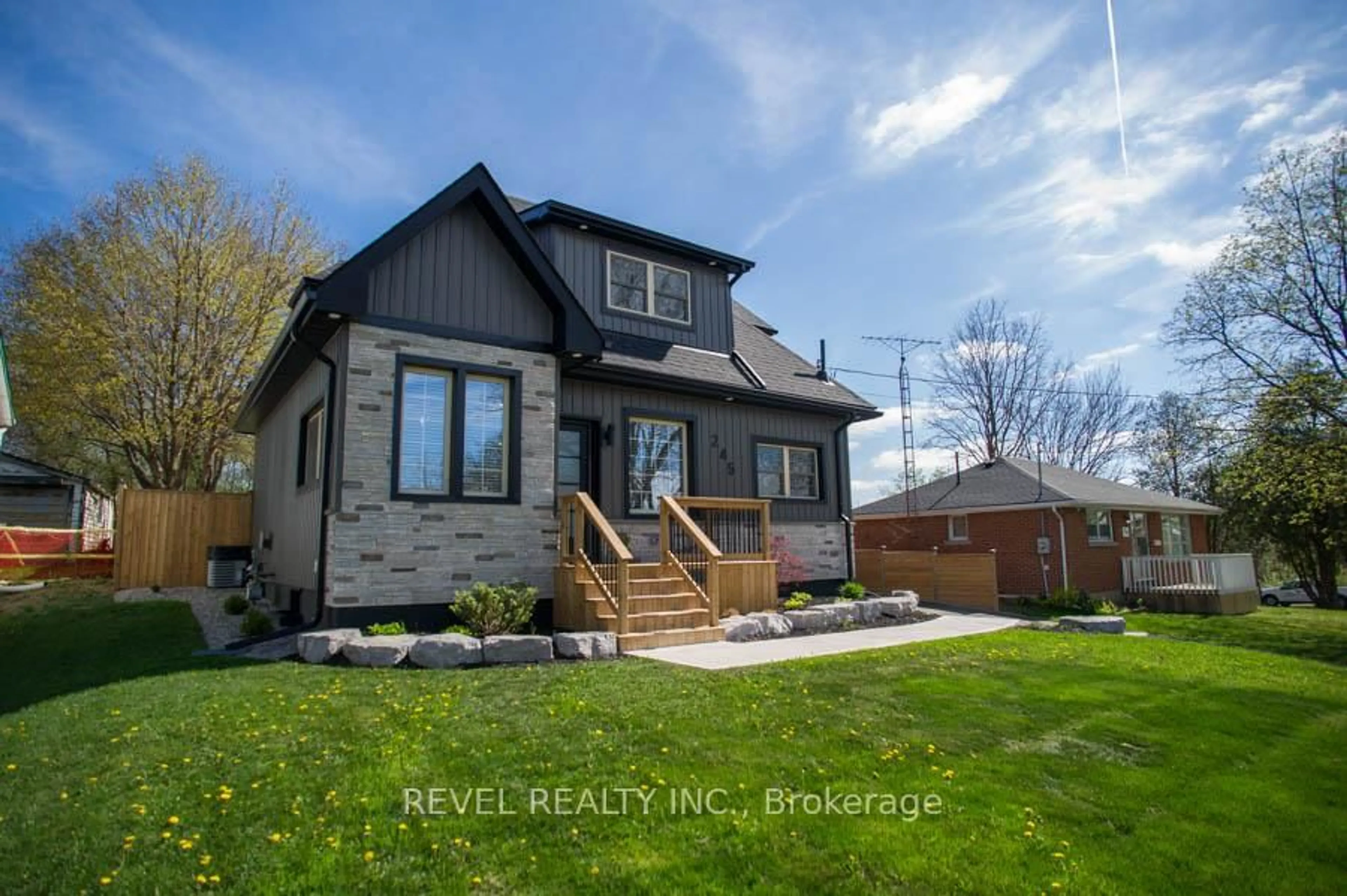 Home with brick exterior material, street for 245 Charing Cross St, Brantford Ontario N3R 2J7