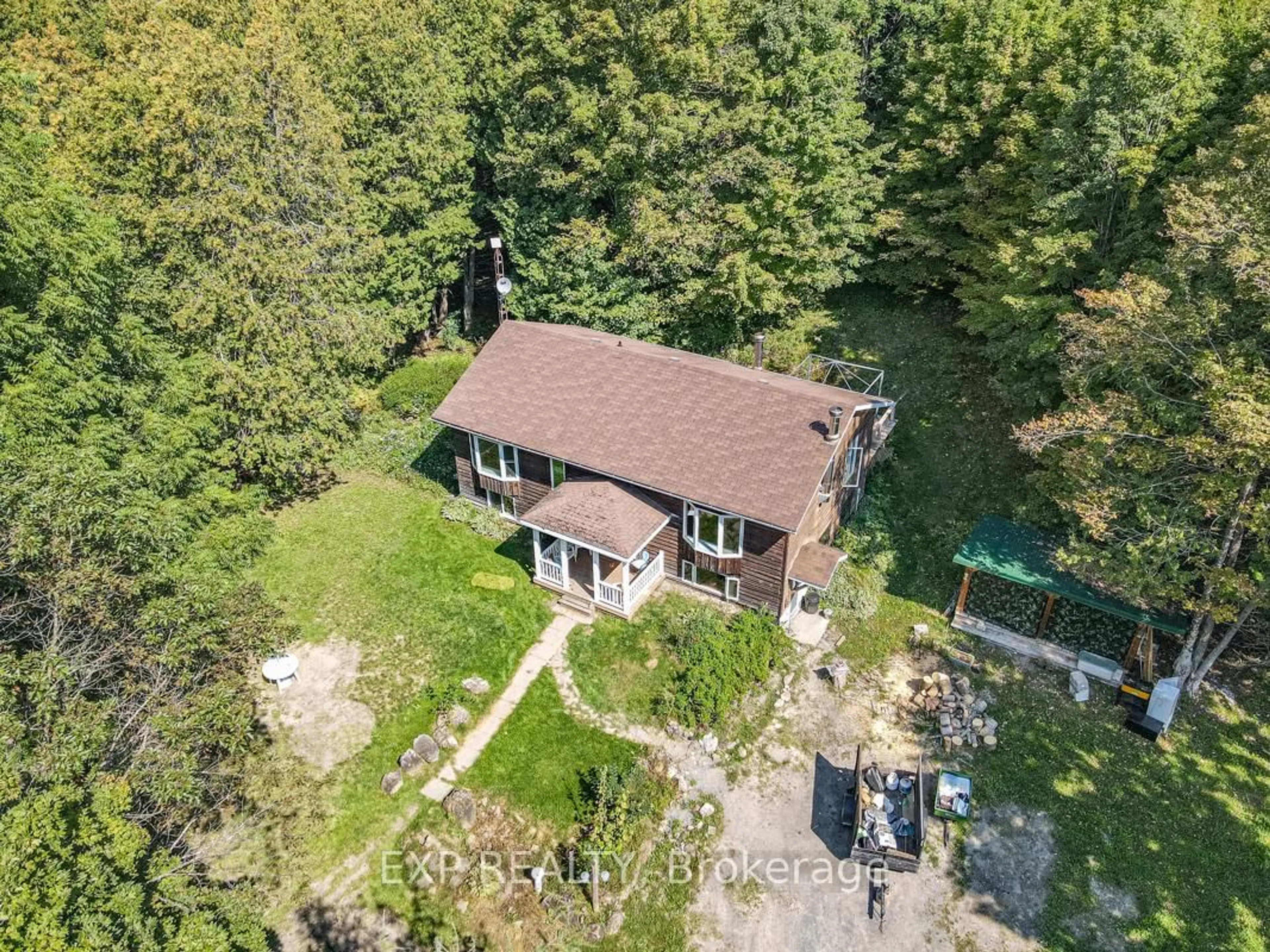 A pic from outside/outdoor area/front of a property/back of a property/a pic from drone, forest/trees view for 192 Gulf Rd, Limoges Ontario K0K 2M0