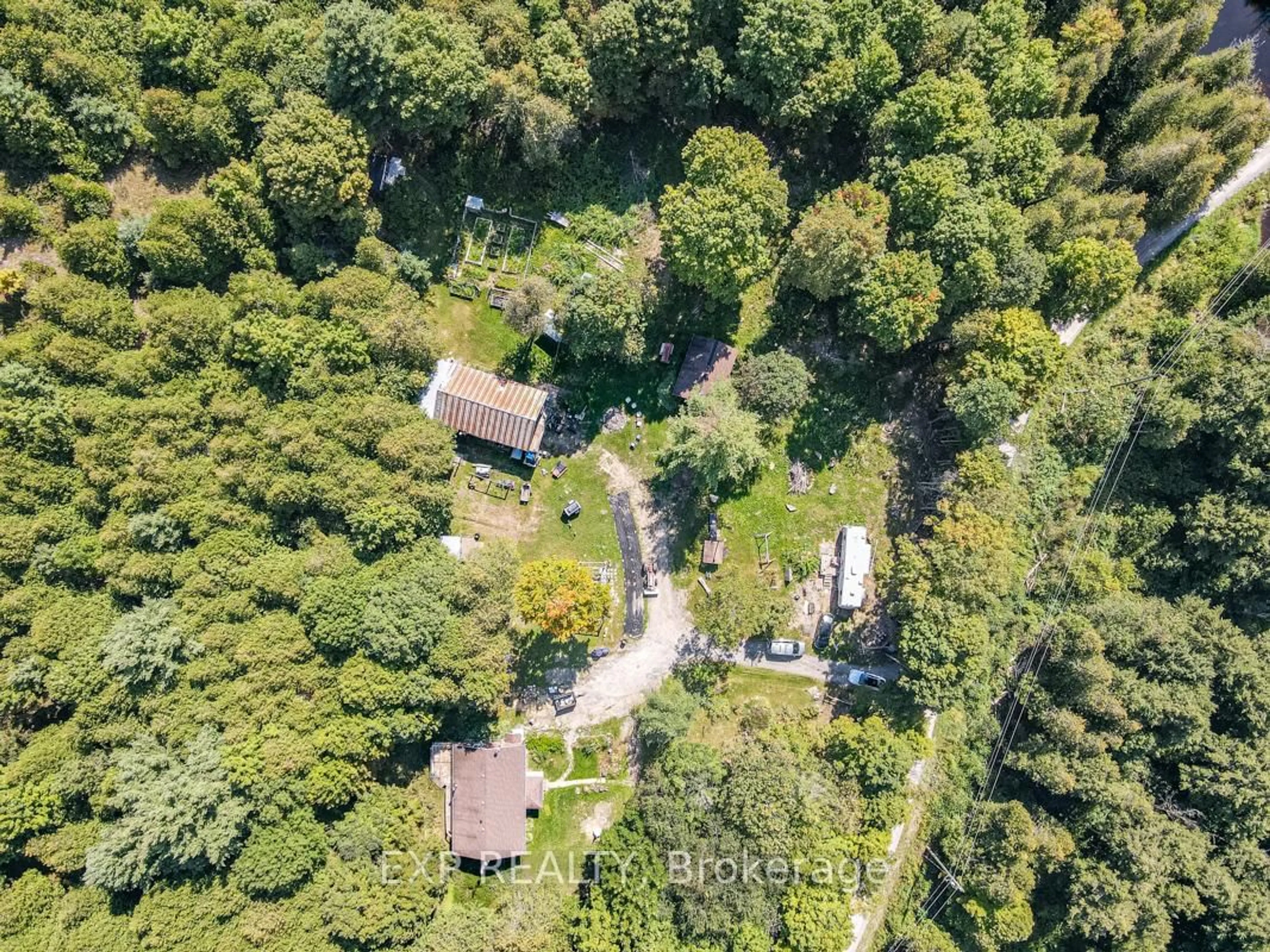 A pic from outside/outdoor area/front of a property/back of a property/a pic from drone, forest/trees view for 192 Gulf Rd, Limoges Ontario K0K 2M0